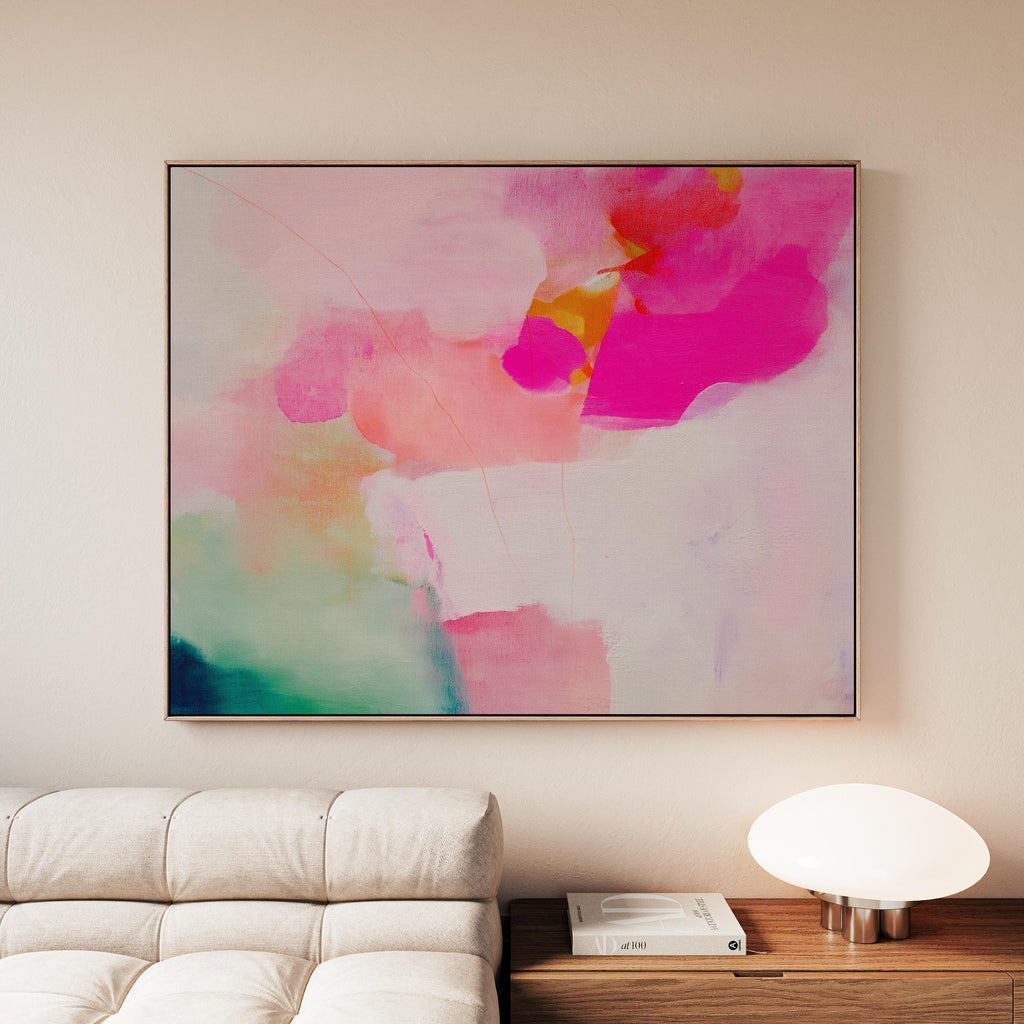 Bloom Aura No. 434 by Muse Studio & Co. pink coral, blush, mint green, and soft peach abstract wall art printed with museum-grade giclée inks on premium gallery-wrapped artist canvas and custom framed in premium wood float frame options including natural, white, black, antique gold, and antique silver, styled as oversized statement art in a modern designer living room.