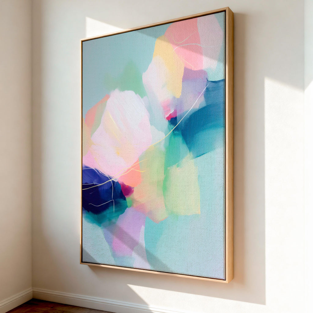 Petal Whisper 1050 by Muse Studio & Co., large vertical pastel floral abstract wall art in blush, yellow, mint and blue on premium cotton canvas with museum-grade giclée inks, framed in natural wood for Soft Atmospheric living rooms and Romantic Botanical spaces.