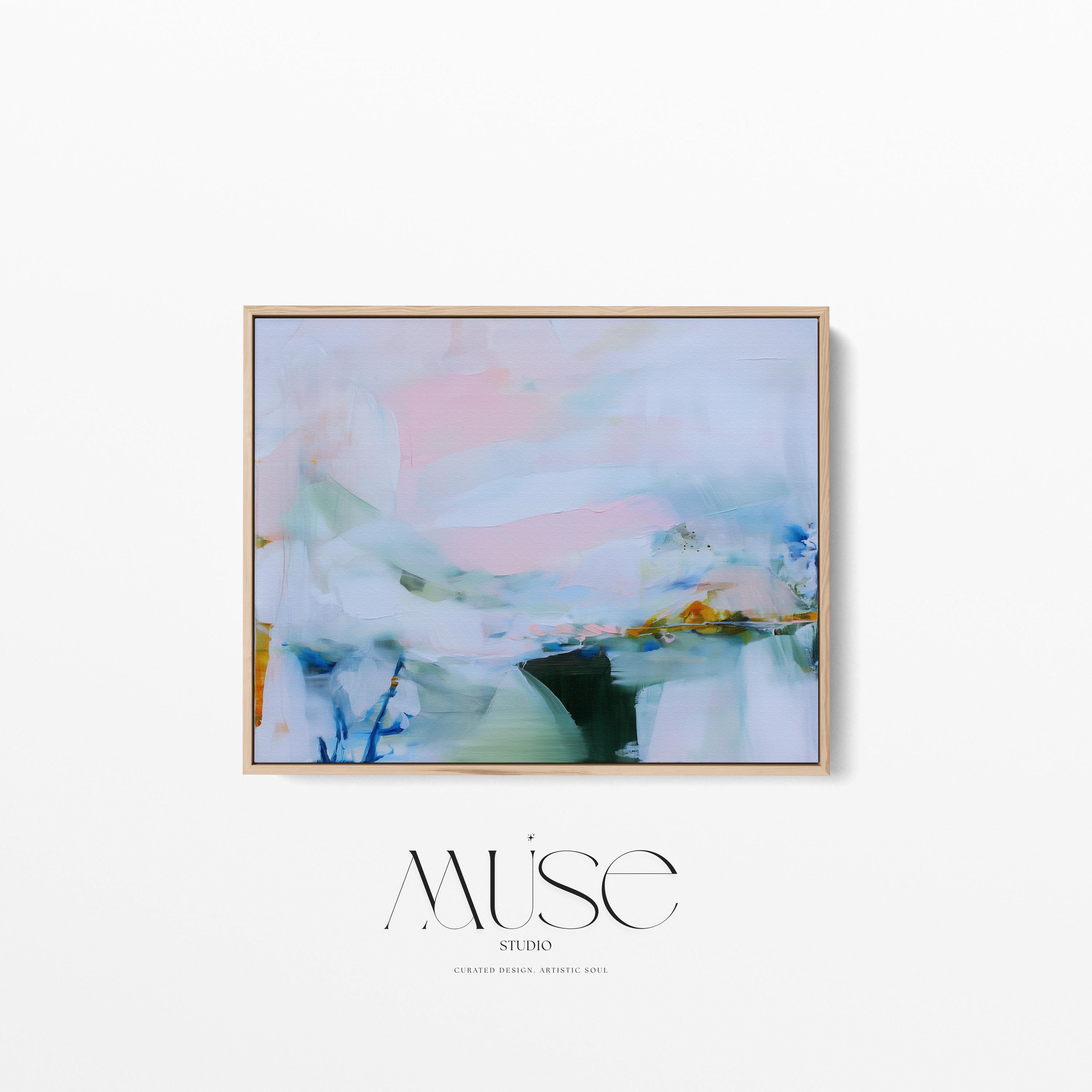 Framed abstract wall art by Muse Studio featuring lilac pink, blue, and soft green tones in a horizontal pastel composition, printed with museum-grade giclée inks on premium canvas, styled for living room or bedroom decor
