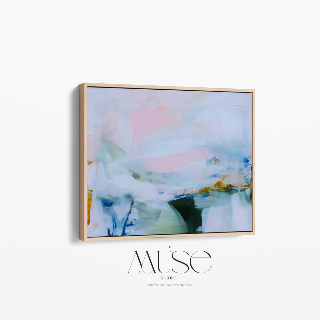 Framed abstract wall art by Muse Studio featuring lilac pink, blue, and soft green tones in a horizontal pastel composition, printed with museum-grade giclée inks on premium canvas, styled for living room or bedroom decor