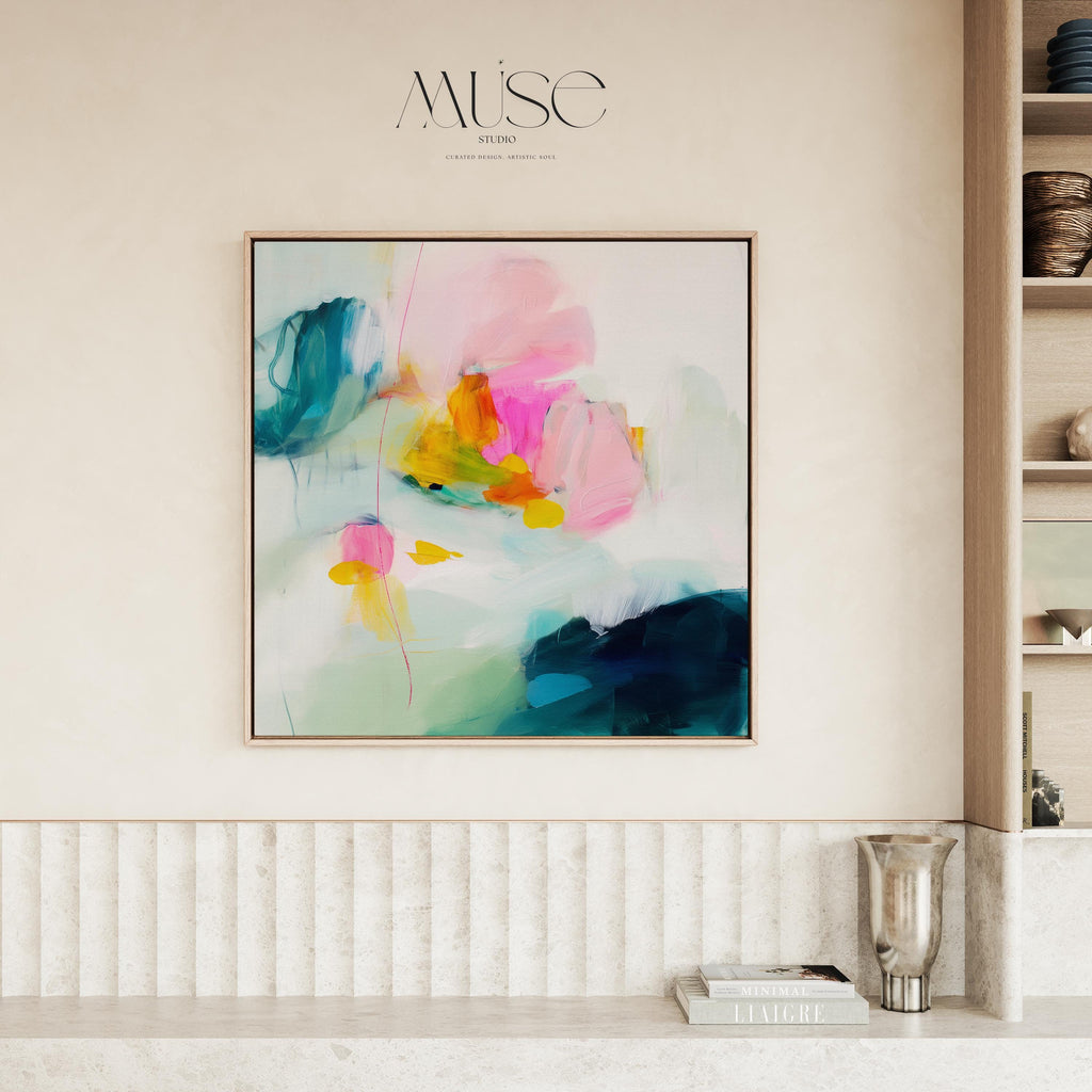 Poppy Fields No. 454 by Muse Studio & Co. vertical framed floral wall art in pink and red poppy tones, printed with museum-grade giclée inks on premium canvas and framed in a natural wood float frame, styled in a bright preppy living room.