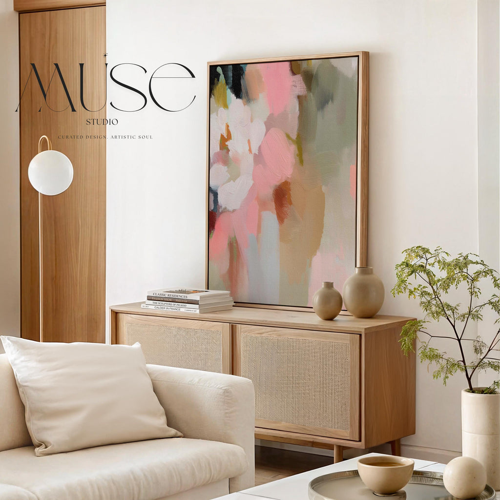 Blossom Dawn 1046 by Muse Studio framed floral abstract wall art inspired by spring gardens, blending blush pink, coral, warm sand, sage green, cream, and charcoal tones. Printed with museum-grade giclée inks on premium artist canvas and set in a custom wood float frame, styled in a Romantic Botanical bedroom.