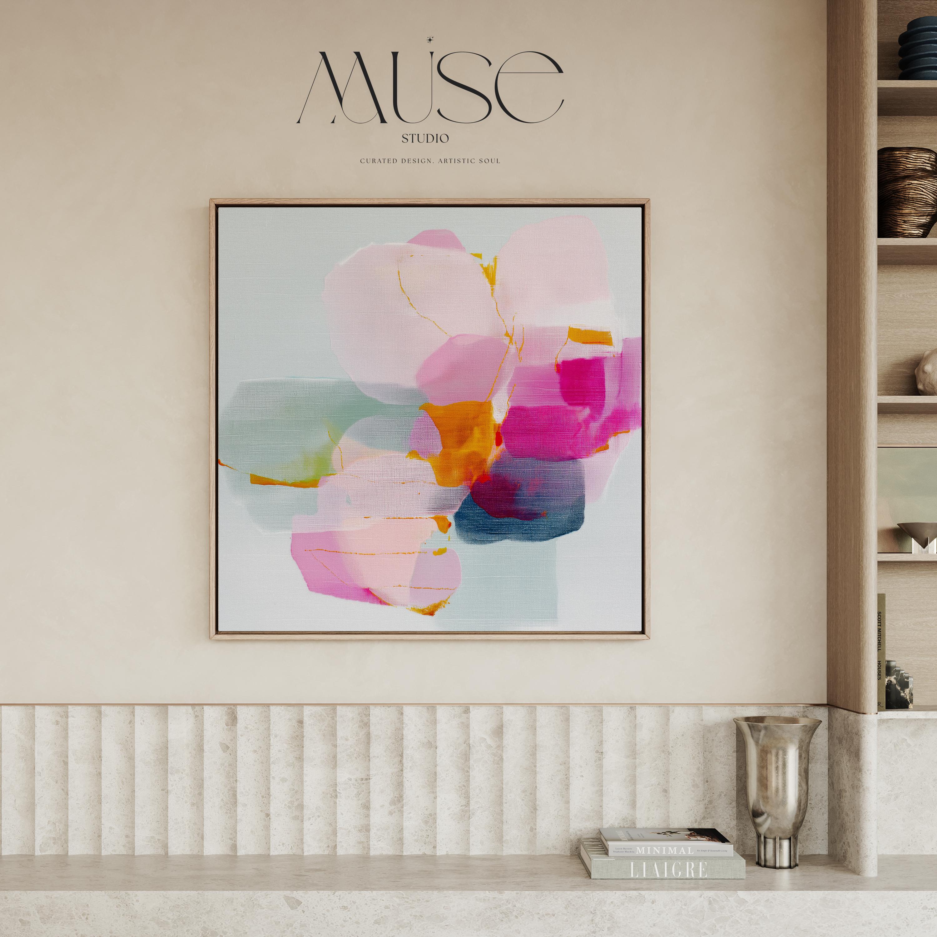 First Bloom 1052 by Muse Studio large framed floral wall art featuring blush pink, magenta, soft blue, and golden ochre painterly blooms printed with museum-grade giclée inks on premium gallery-wrapped canvas, framed in natural wood for Romantic Botanical bedrooms and serene designer interiors.