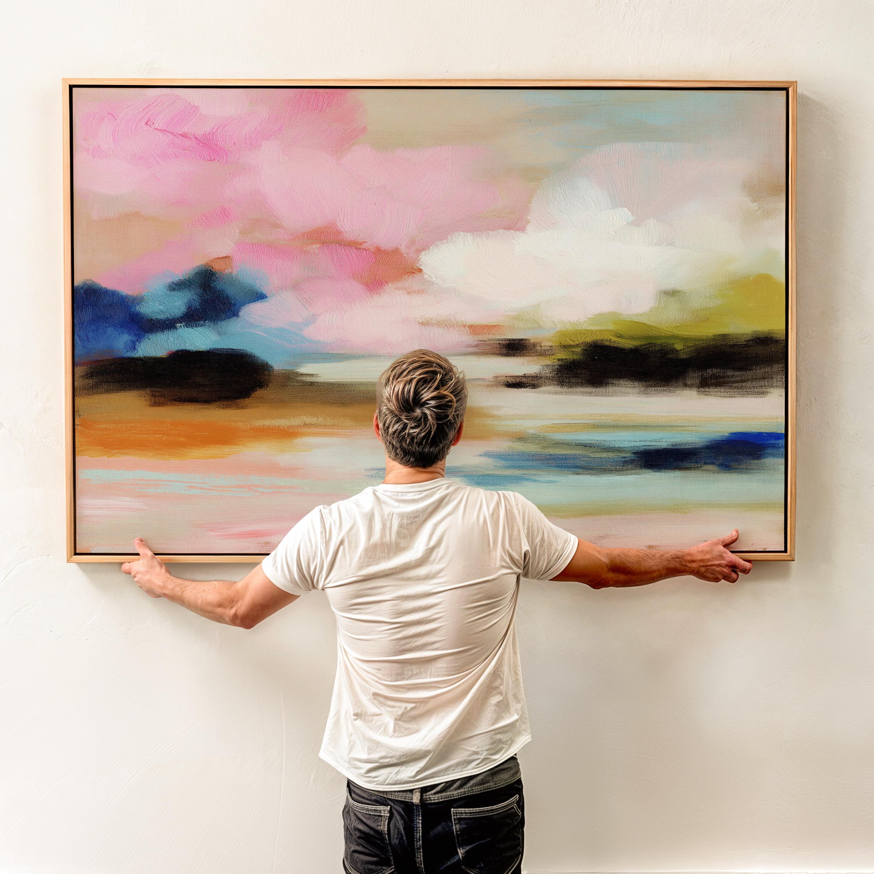 Muse Studio horizontal abstract framed wall art featuring blush pink, soft peach, sky blue, olive green, ivory, and deep navy in a dreamy landscape-inspired composition, available in custom premium wood frame options including natural, white, black, and antique gold and silver float frames, custom made to order for bedroom decor, living room decor, and soft contemporary interiors.