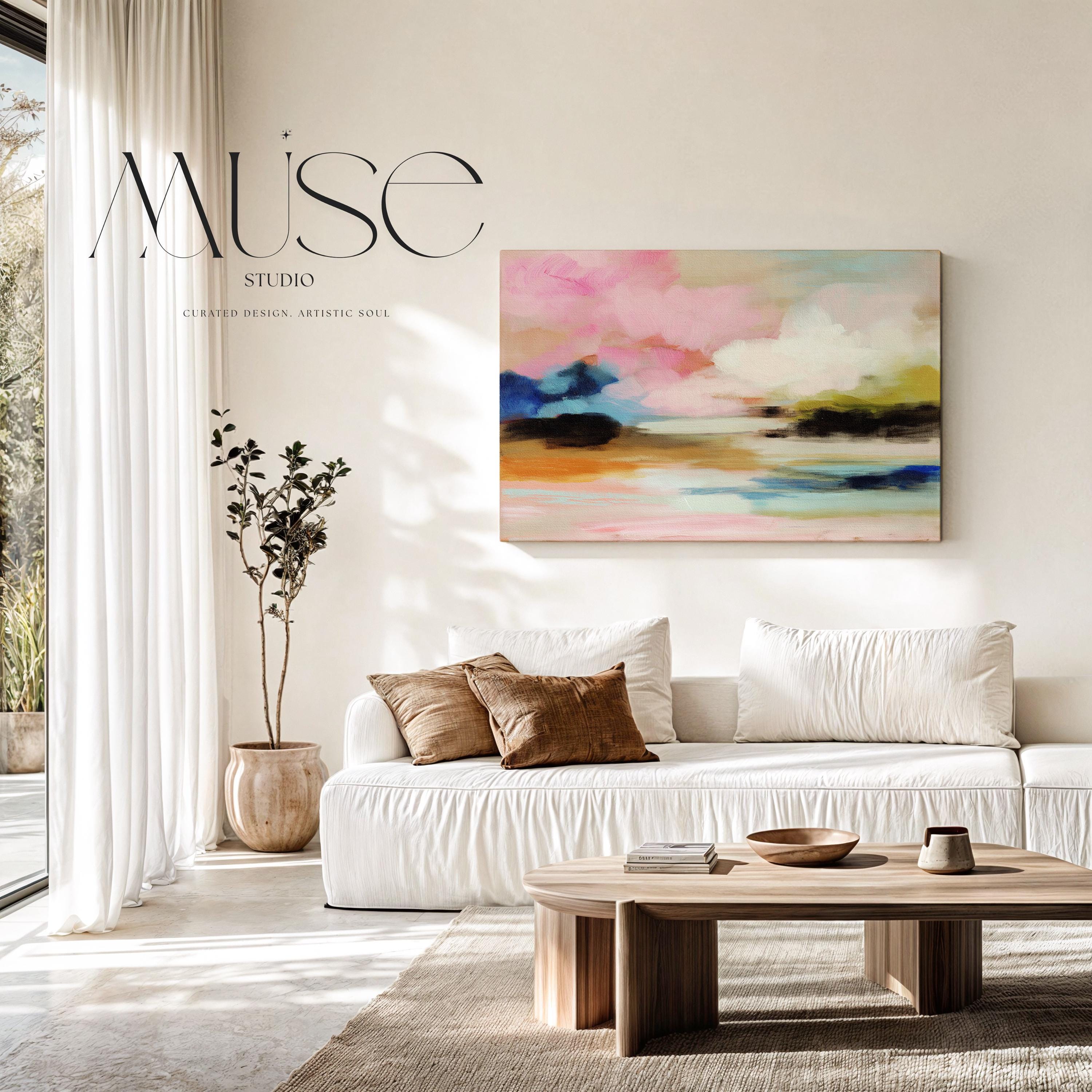 Muse Studio horizontal abstract canvas wall art featuring blush pink, soft peach, sky blue, olive green, ivory, and deep navy in a dreamy landscape-inspired composition, printed with museum-grade giclée inks on premium gallery-wrapped artist canvas for bedroom decor, living room decor, and soft contemporary interiors.