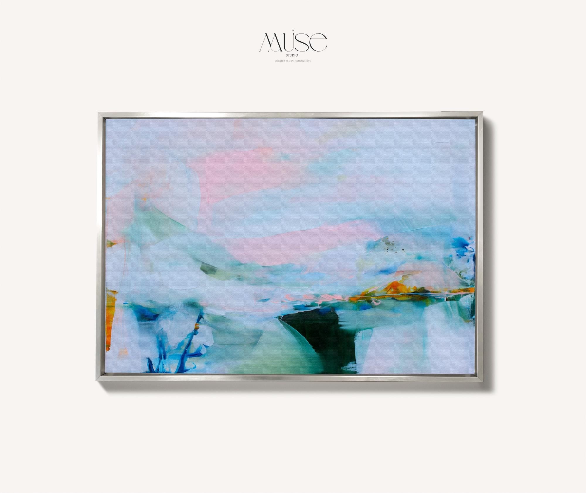 Framed abstract wall art by Muse Studio featuring lilac pink, blue, and soft green tones in a horizontal pastel composition, printed with museum-grade giclée inks on premium canvas, styled for living room or bedroom decor