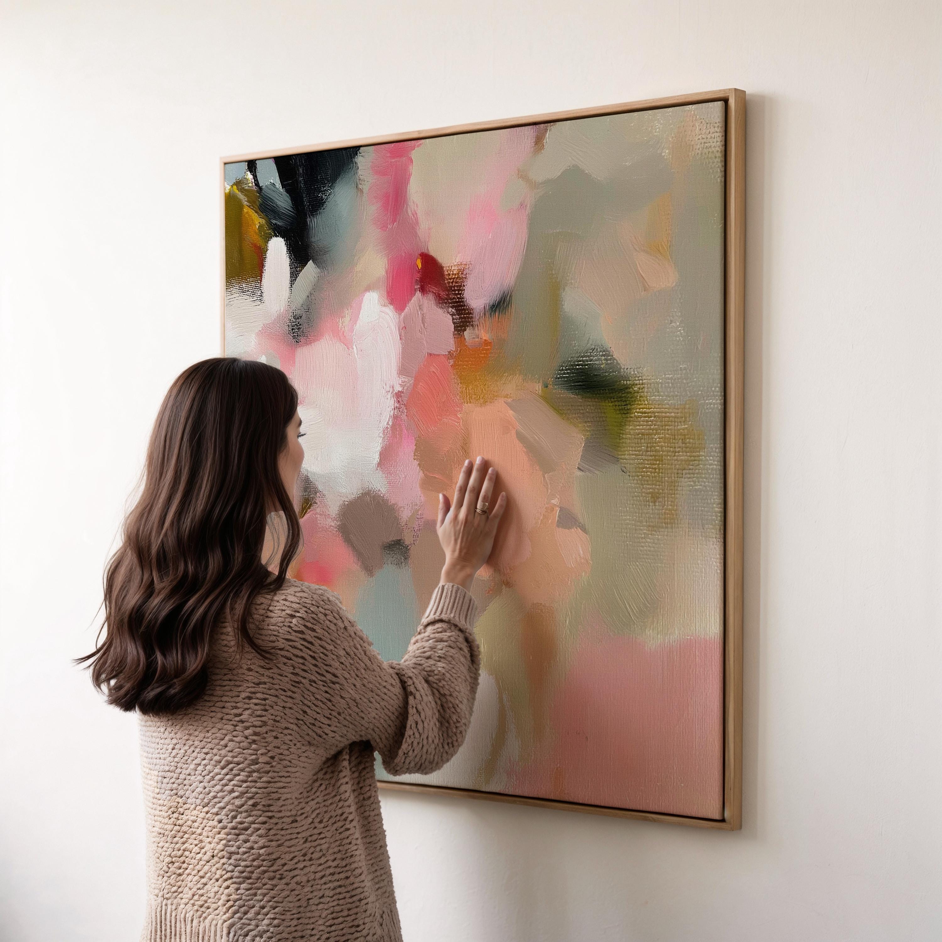 Spring Sonata No. 1047 by Muse Studio & Co. blush pink peach floral abstract wall art printed with museum-grade giclée inks on premium gallery-wrapped cotton canvas and framed in natural wood, styled above a linen bed in a serene designer bedroom with soft botanical decor.