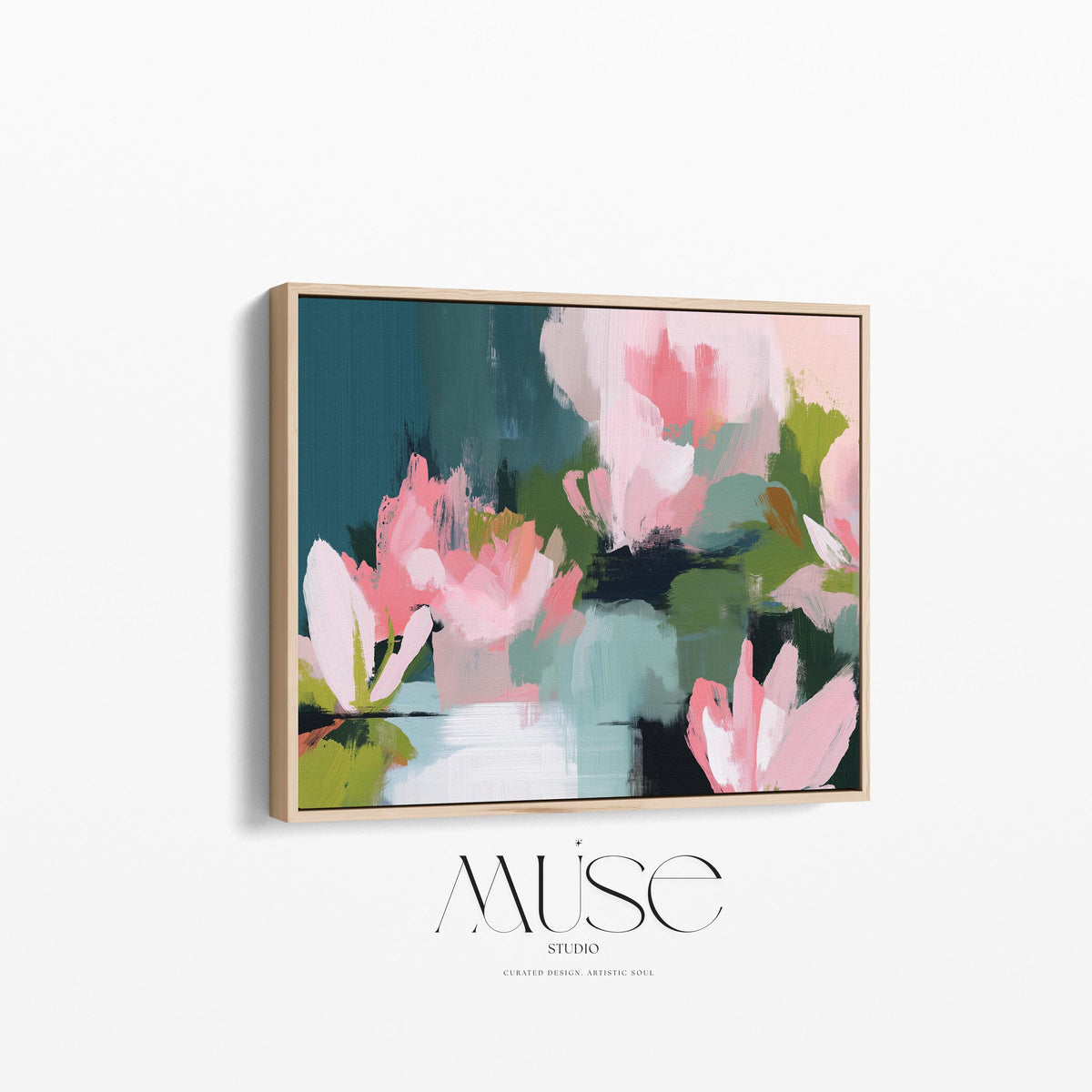 Magnolia Reverie No. 1037 by Muse Studio & Co. blush pink magnolia floral wall art with sage green and deep teal botanical brushwork printed with museum-grade giclée inks on premium gallery-wrapped cotton canvas and custom framed in natural wood with optional white, black, antique gold, or antique silver float frames to complement any decor style, styled in a coastal tropical beach home living room with airy interiors and light wood floors.