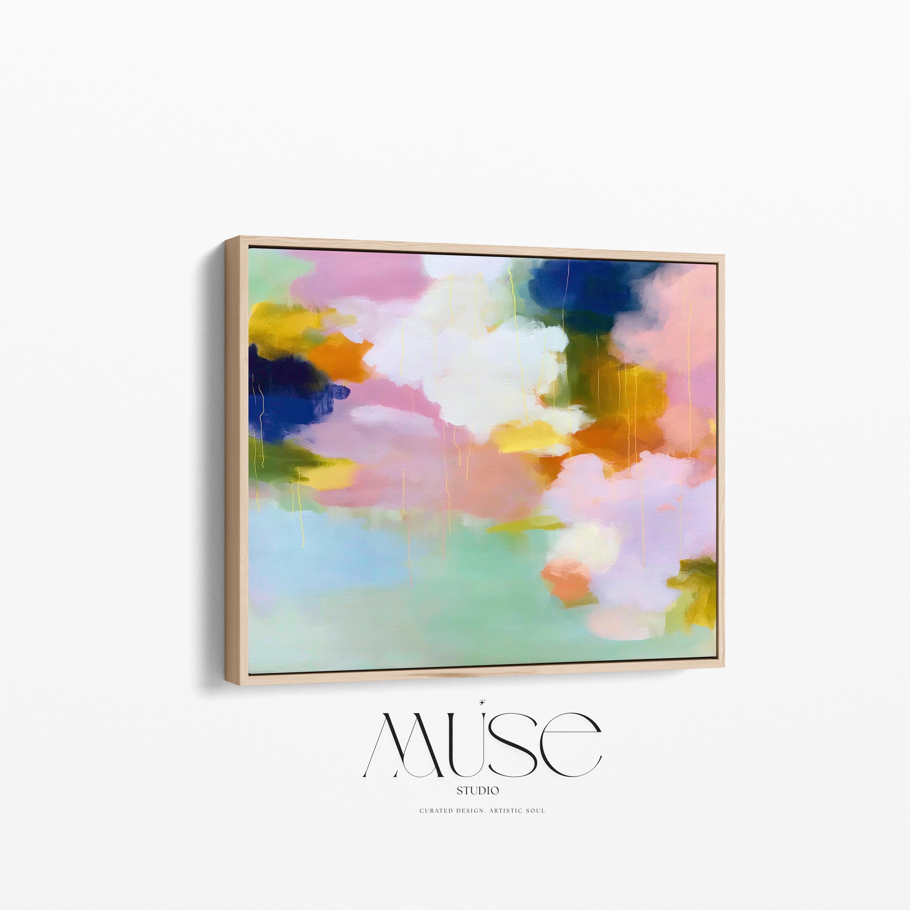 Blush Crescendo No. 291 by Muse Studio & Co. large horizontal pastel abstract framed canvas wall art in blush pink, teal and cream tones printed with museum-grade giclée inks on premium gallery-wrapped artist canvas with custom float frame options in natural, white, black, antique gold or antique silver, styled above a sofa in a soft contemporary living room.