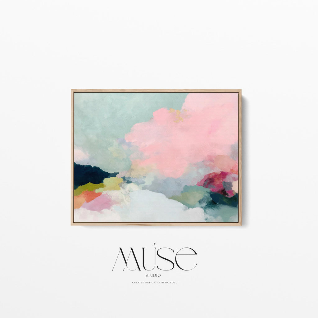 Spring Dawn No. 1059 by Muse Studio & Co. blush pink, mint green, navy, coral, and soft butter yellow abstract wall art printed with museum-grade giclée inks on premium gallery-wrapped artist canvas and custom framed in premium wood float frame options including natural, white, black, antique gold, and antique silver, styled above a neutral sofa in a calm designer living room.