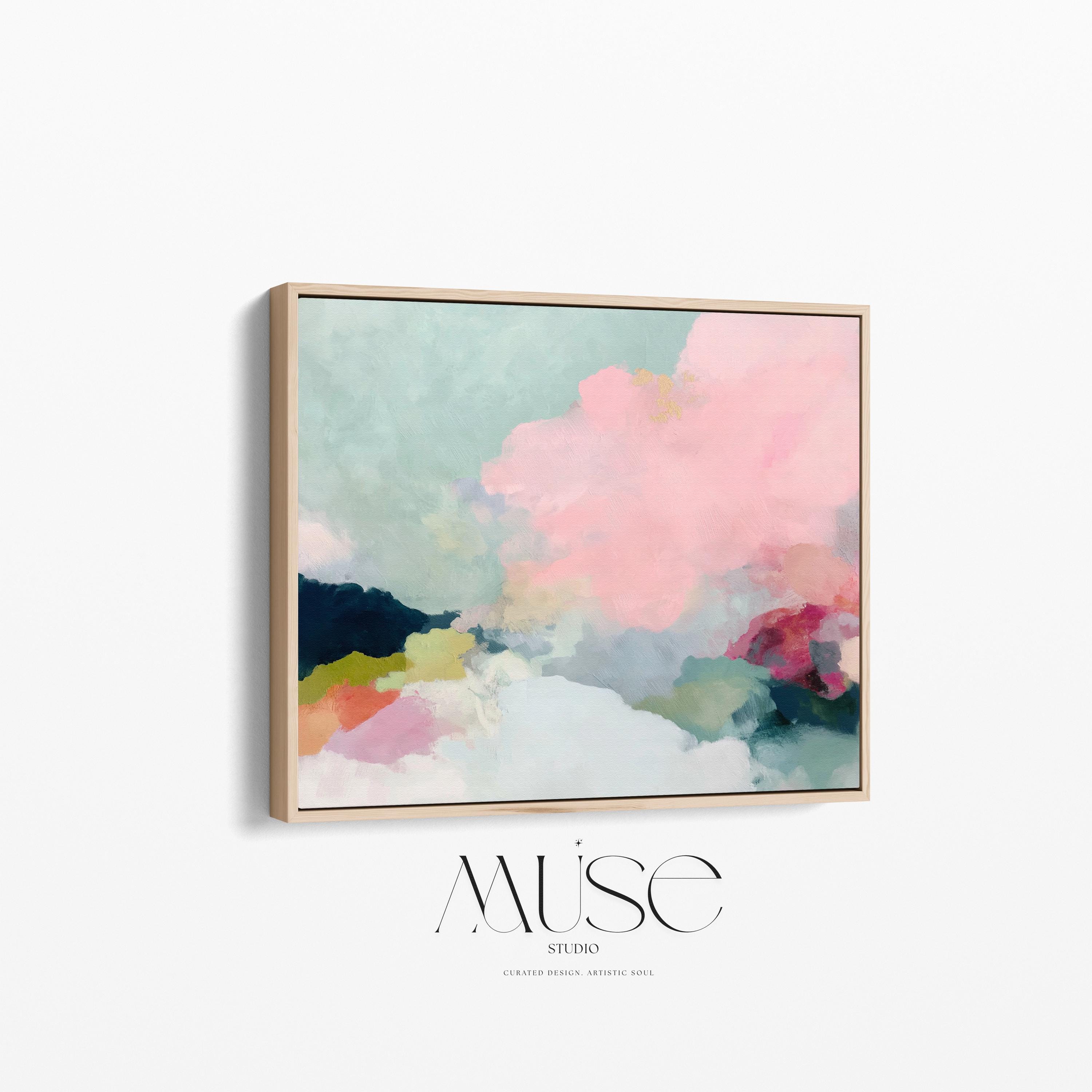 Spring Dawn No. 1059 by Muse Studio & Co. blush pink, mint green, navy, coral, and soft butter yellow abstract wall art printed with museum-grade giclée inks on premium gallery-wrapped artist canvas and custom framed in premium wood float frame options including natural, white, black, antique gold, and antique silver, styled above a neutral sofa in a calm designer living room.