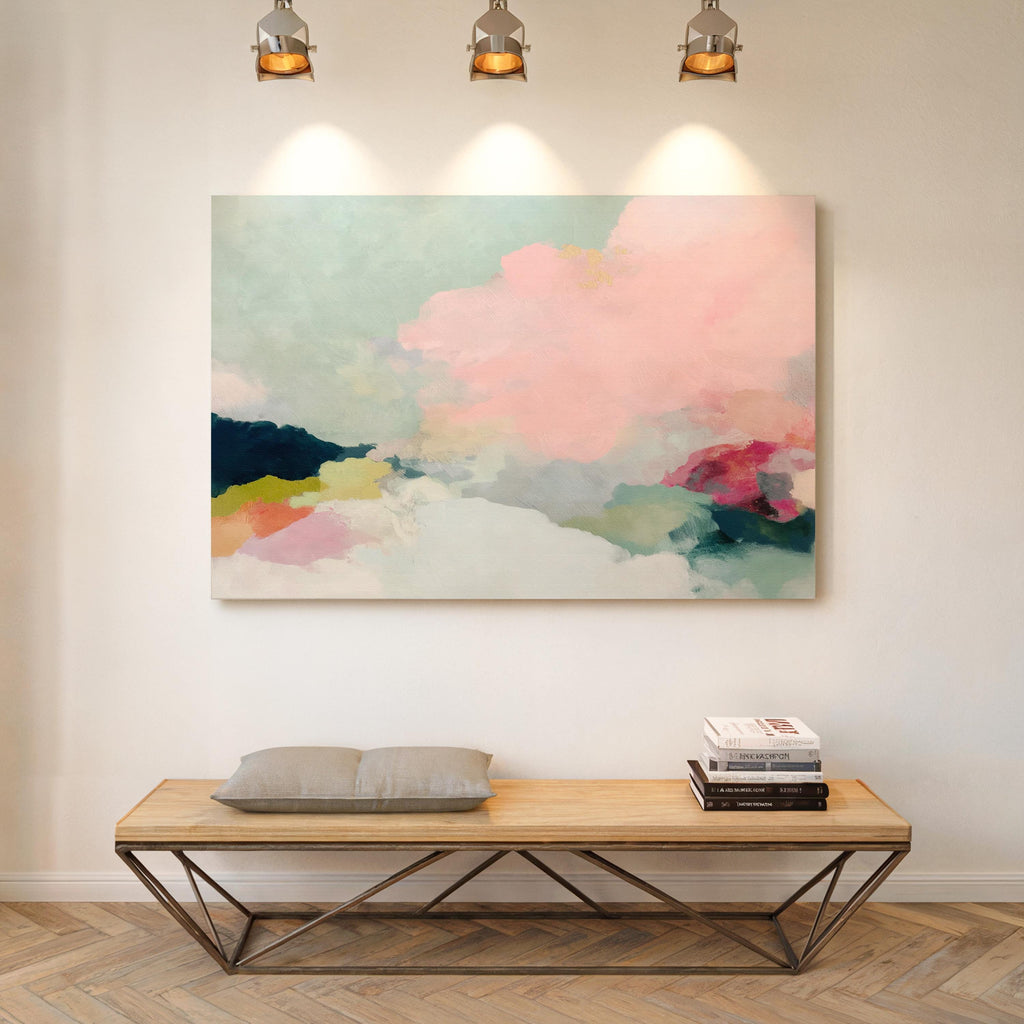 Spring Dawn No. 1059 by Muse Studio & Co. pink clouds abstract canvas wall art featuring blush pink, mint green, navy, coral, and soft butter yellow pastel colors printed with museum-grade giclée inks on premium gallery-wrapped artist canvas, styled above a neutral sofa in a calm designer living room interior.