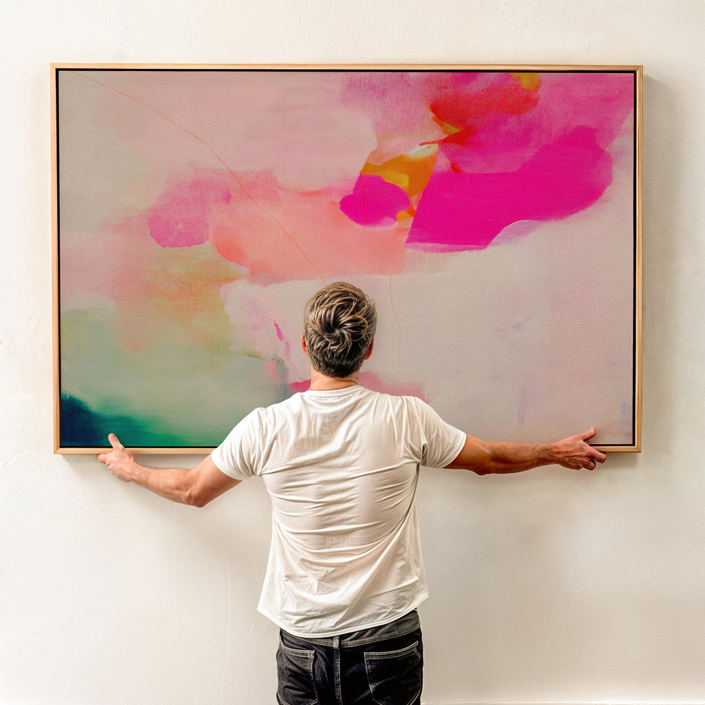 Bloom Aura No. 434 by Muse Studio & Co. pink coral, blush, mint green, and soft peach abstract wall art printed with museum-grade giclée inks on premium gallery-wrapped artist canvas and custom framed in premium wood float frame options including natural, white, black, antique gold, and antique silver, styled as oversized statement art in a modern designer living room.