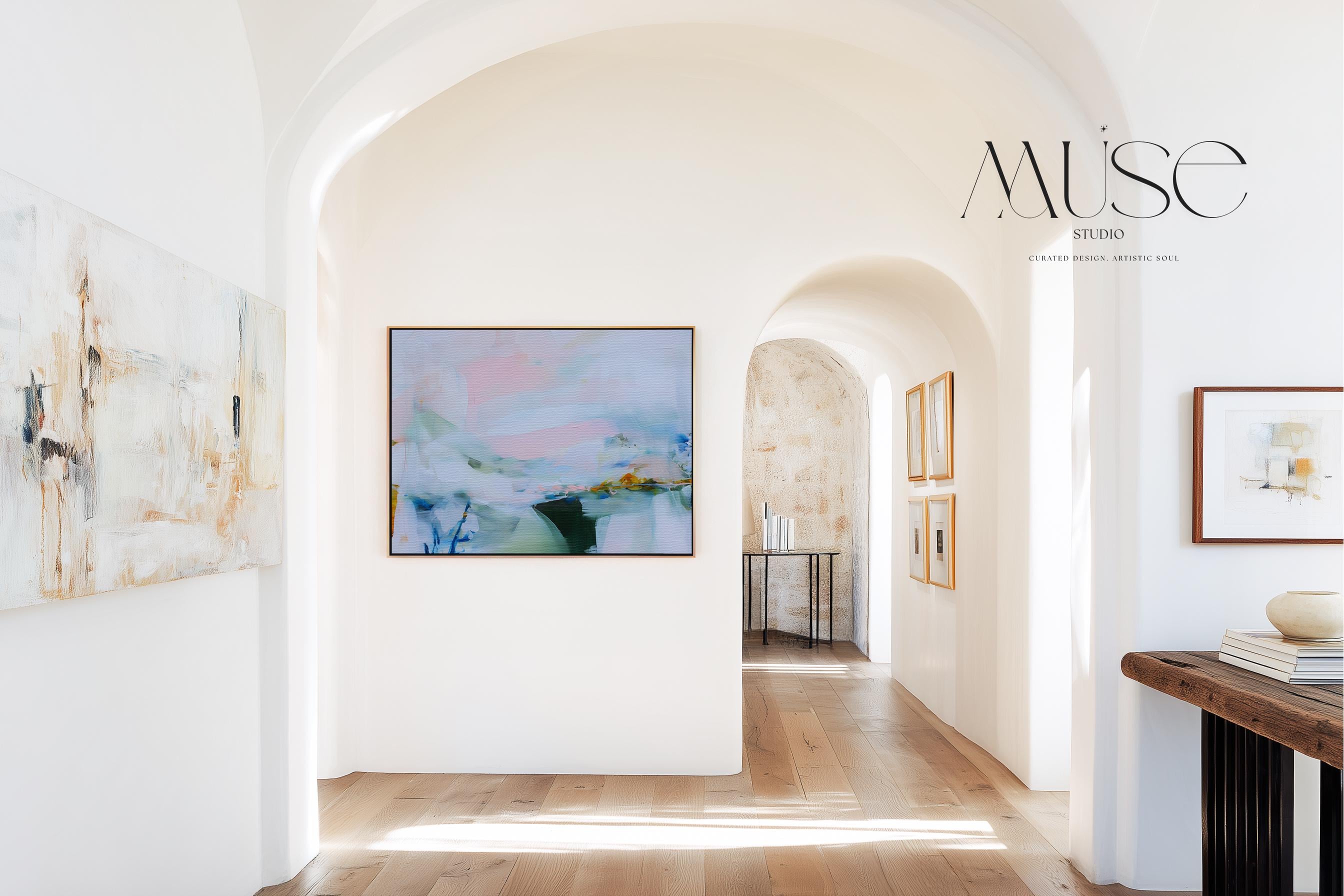 Framed abstract wall art by Muse Studio featuring lilac pink, blue, and soft green tones in a horizontal pastel composition, printed with museum-grade giclée inks on premium canvas, styled for living room or bedroom decor