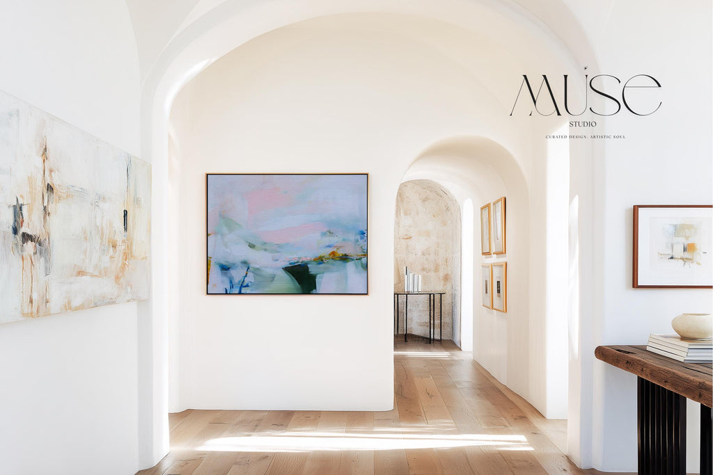 Framed abstract wall art by Muse Studio featuring lilac pink, blue, and soft green tones in a horizontal pastel composition, printed with museum-grade giclée inks on premium canvas, styled for living room or bedroom decor