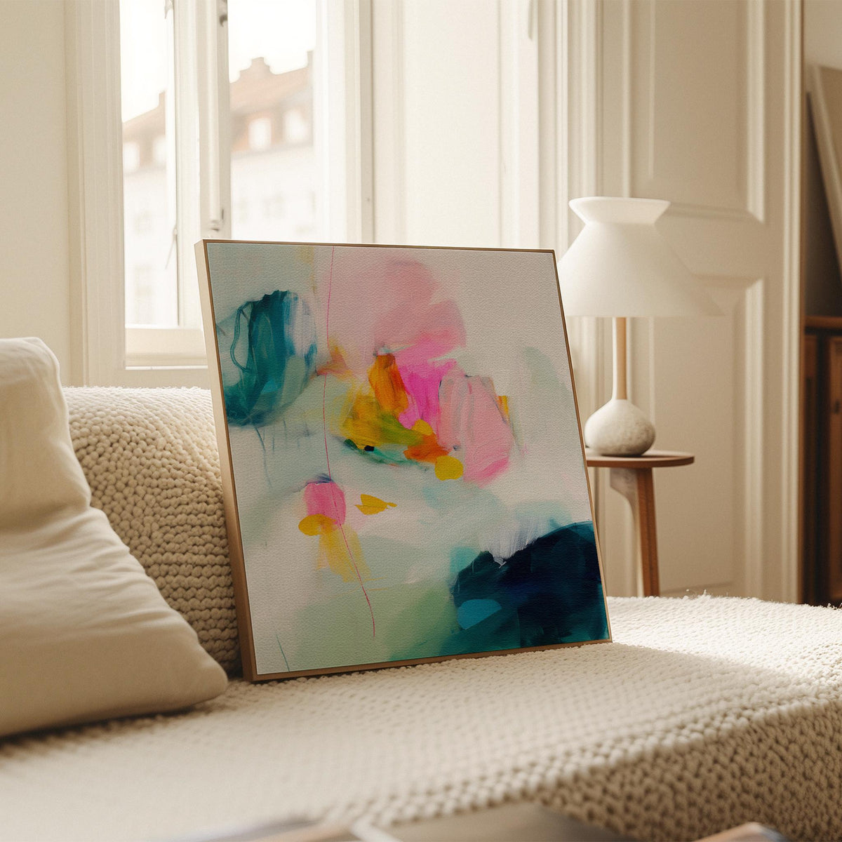 Poppy Fields No. 454 by Muse Studio & Co. vertical framed floral wall art in pink and red poppy tones, printed with museum-grade giclée inks on premium canvas and framed in a natural wood float frame, styled in a bright preppy living room.