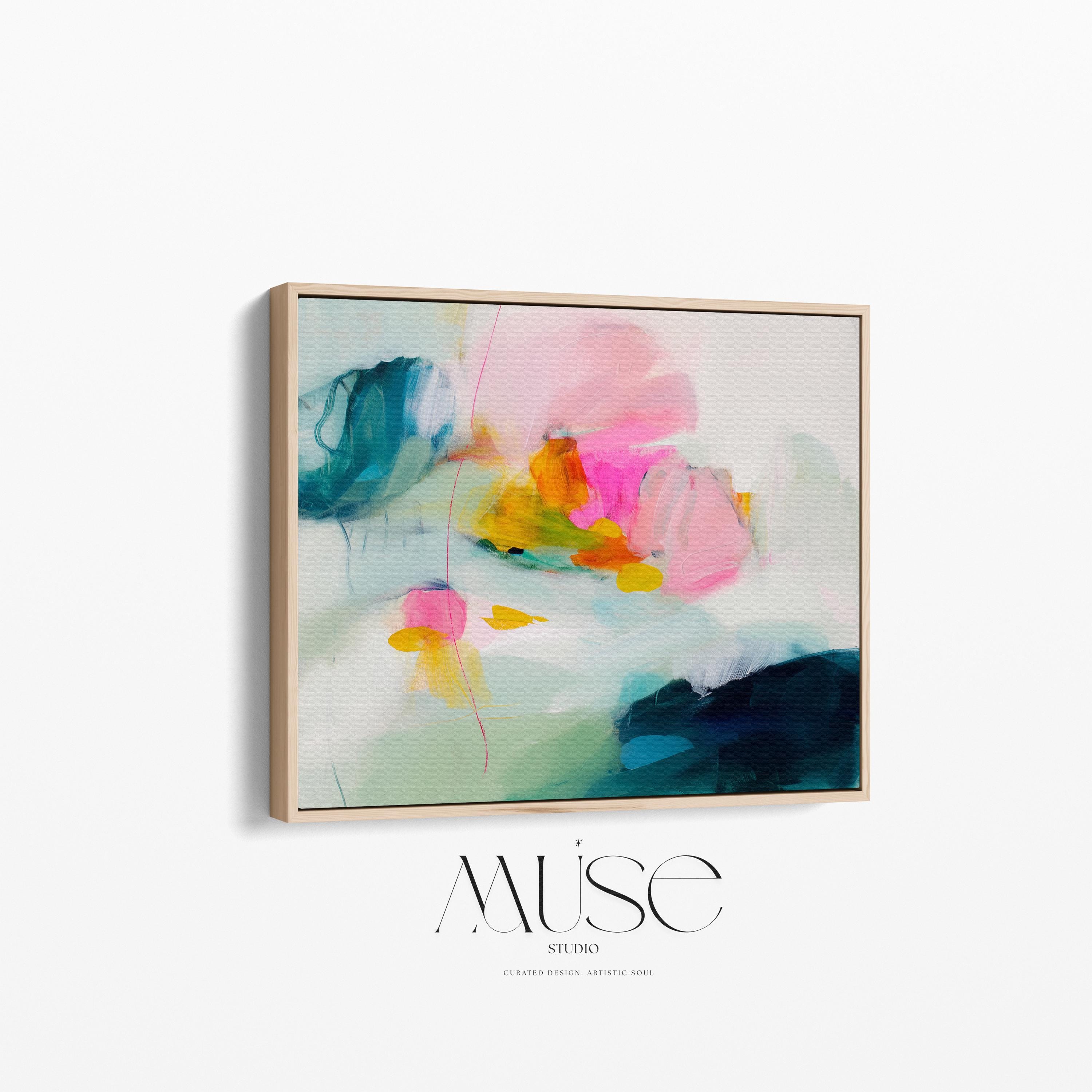 Poppy Fields No. 454 by Muse Studio & Co. horizontal colorful abstract wall art in pink, teal, yellow, and cream printed with museum-grade giclée inks on premium canvas, custom framed in natural, white, black, antique gold or silver float frame, styled in a bright designer living room.