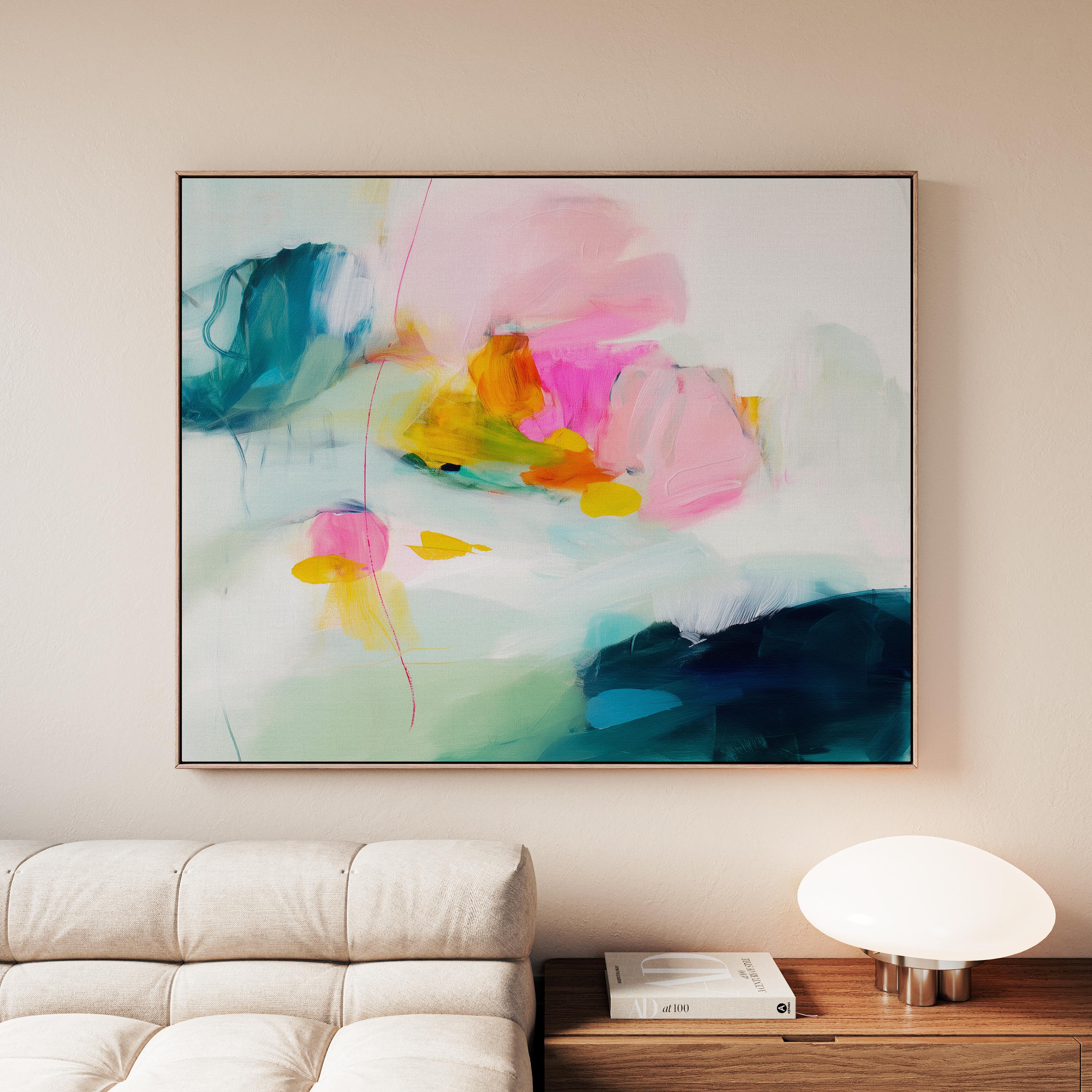 Poppy Fields No. 454 by Muse Studio & Co. horizontal colorful abstract wall art in pink, teal, yellow, and cream printed with museum-grade giclée inks on premium canvas, custom framed in natural, white, black, antique gold or silver float frame, styled in a bright designer living room.