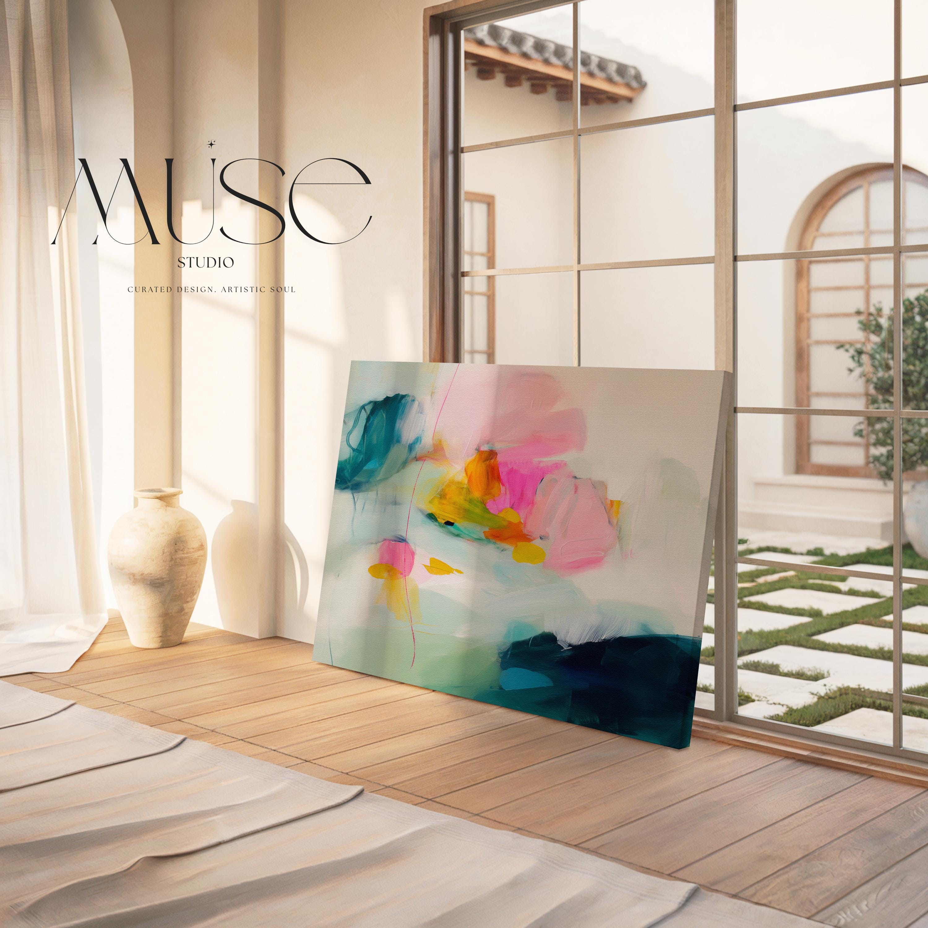 Poppy Fields No. 454 by Muse Studio & Co. colorful abstract wall art in pink, teal, yellow, and cream tones printed with museum-grade giclée inks on premium gallery-wrapped canvas, styled as large statement wall decor in a bright modern living room.
