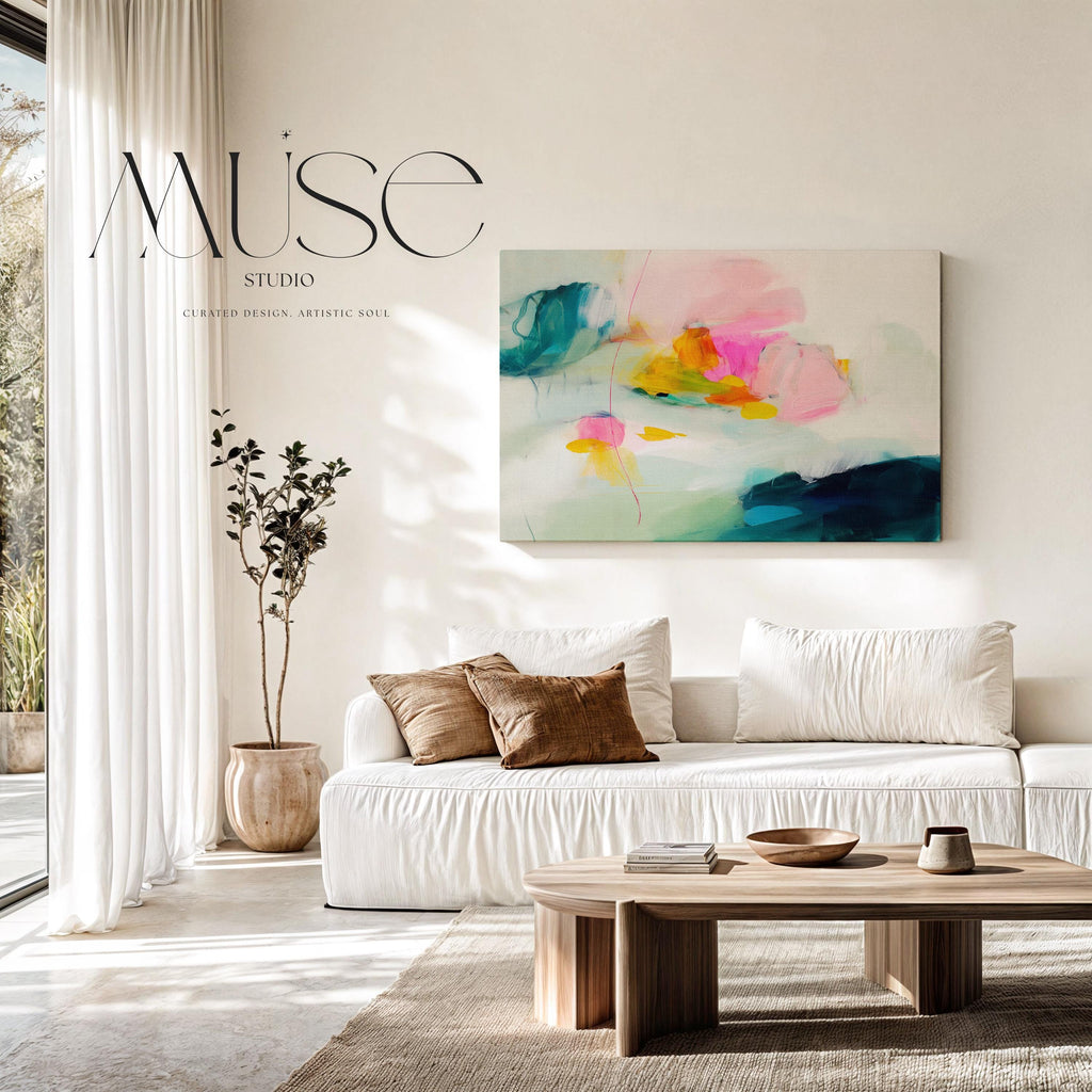 Poppy Fields No. 454 by Muse Studio & Co. colorful abstract wall art in pink, teal, yellow, and cream tones printed with museum-grade giclée inks on premium gallery-wrapped canvas, styled as large statement wall decor in a bright modern living room.