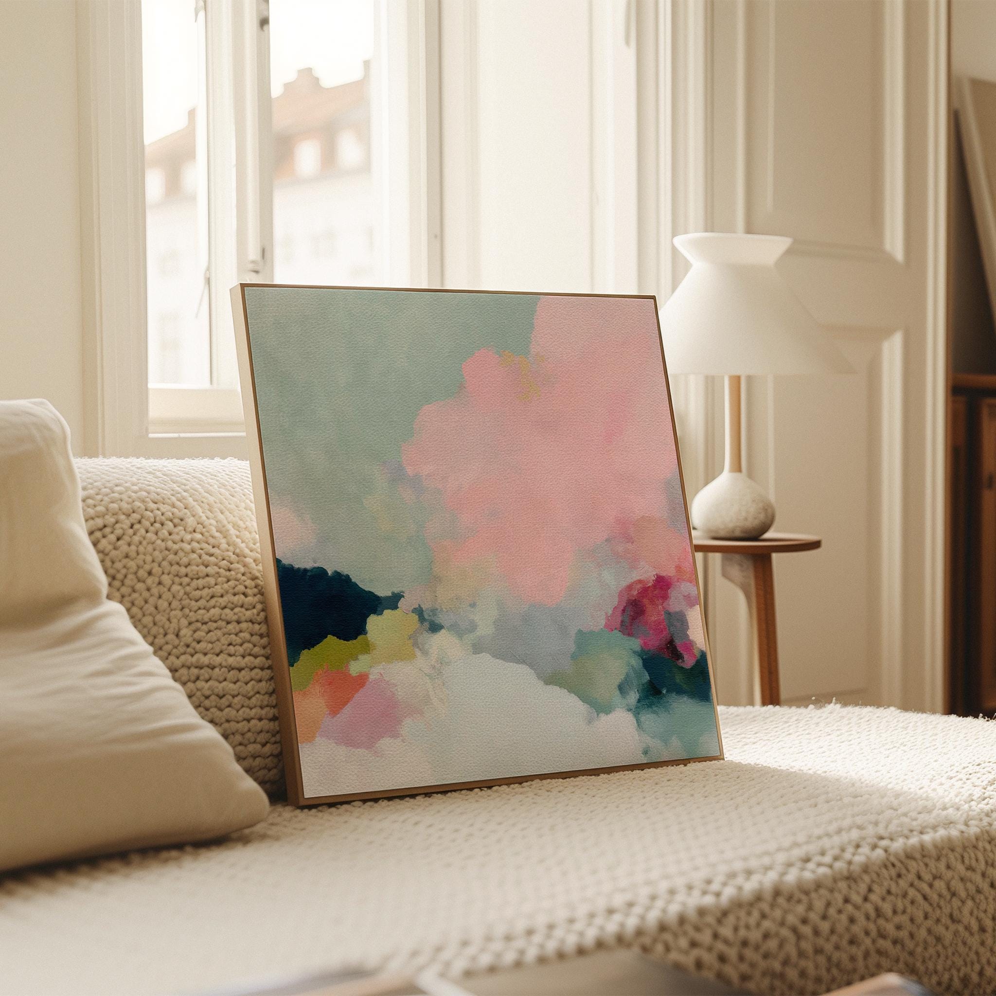 Square pastel pink cloud canvas wall art by Muse Studio featuring soft blush, cream, and gentle sage tones in a dreamy abstract composition. Printed with museum-grade giclée inks on premium gallery-wrapped canvas, perfect for nursery decor, baby girl room, or soft modern spaces.