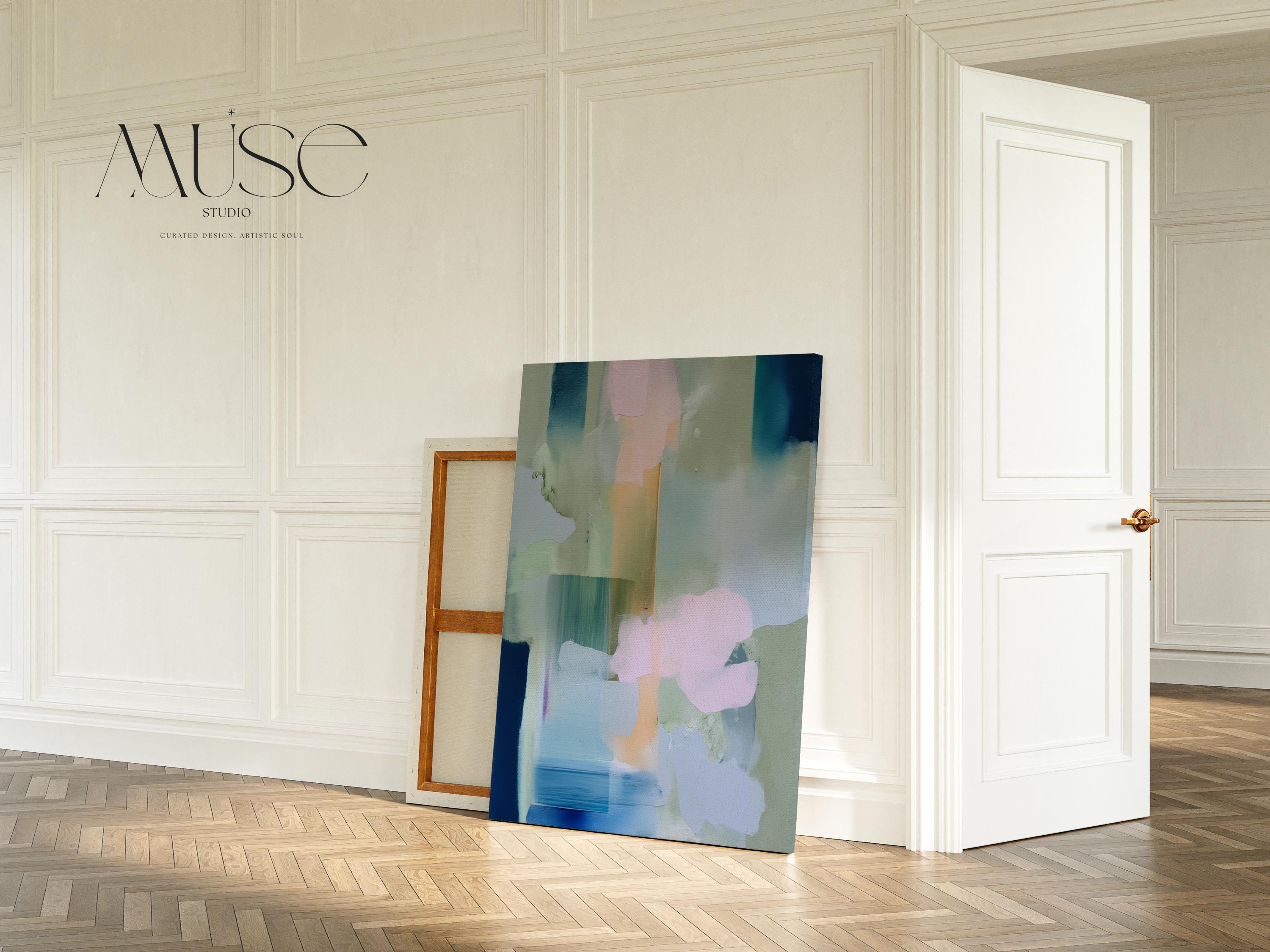 Muse Studio vertical pastel botanical canvas wall art in a blush blue sage palette, available as stretched canvas and rolled canvas, featuring soft pink, misty blue, pale sage, ivory, and deep navy abstract organic forms, printed with museum-grade giclée inks on premium artist canvas for bedroom decor, spa decor, and serene soft contemporary interiors.