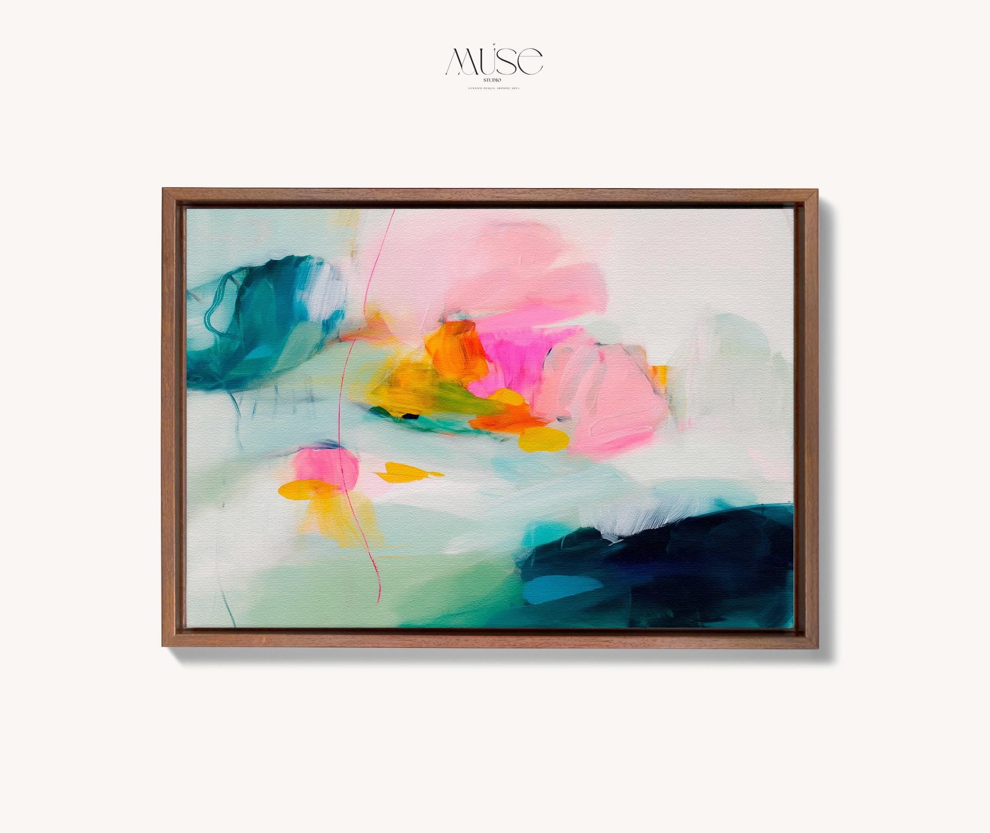 Poppy Fields No. 454 by Muse Studio & Co. horizontal colorful abstract wall art in pink, teal, yellow, and cream printed with museum-grade giclée inks on premium canvas, custom framed in natural, white, black, antique gold or silver float frame, styled in a bright designer living room.