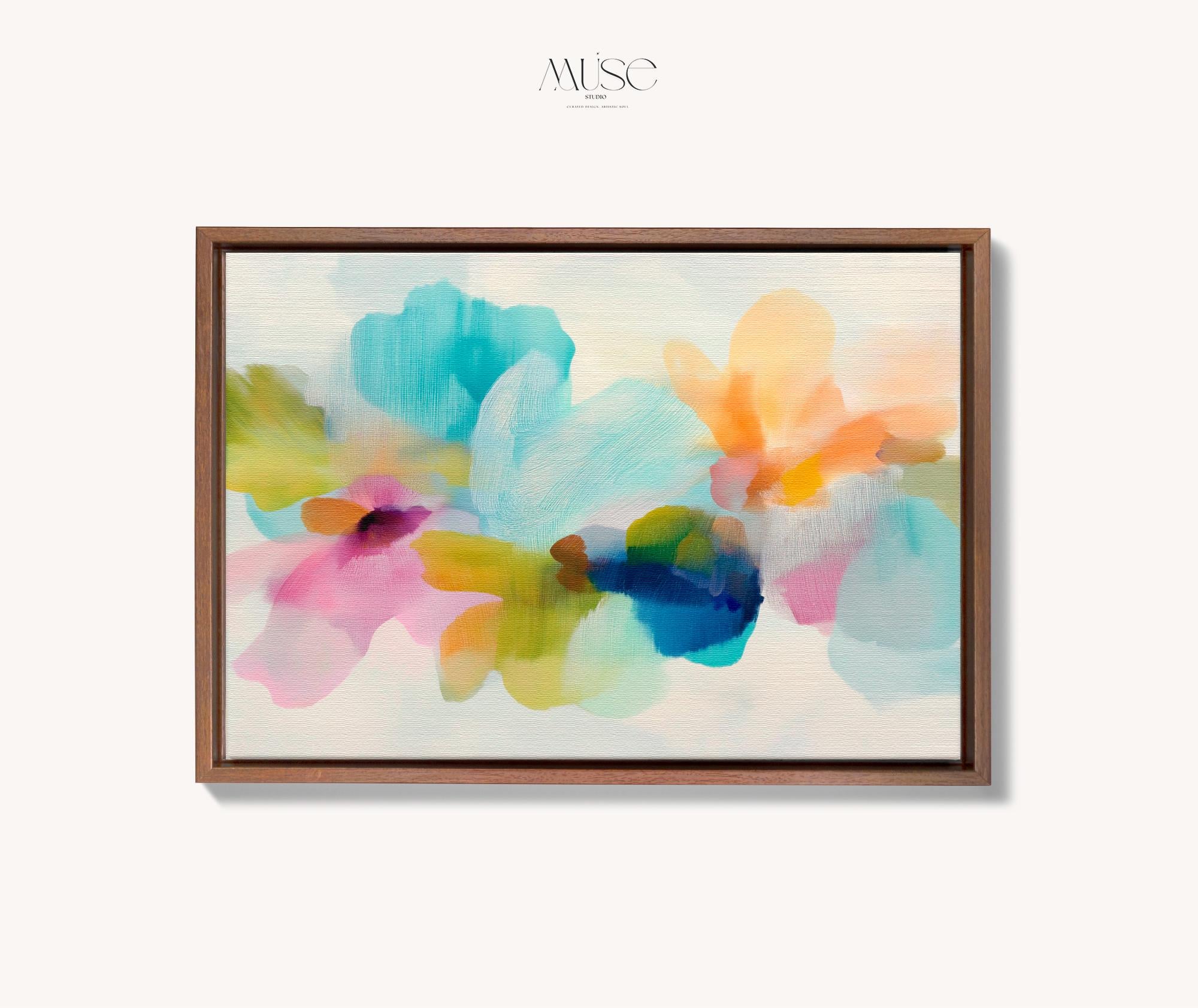 Muse Studio framed canvas wall art in pastel aqua, blush pink, peach, yellow, green, and cobalt blue floral abstract style, printed with museum-grade giclée inks on premium artist-grade canvas, available as a horizontal framed canvas, styled in a serene bedroom, living room, or soft contemporary office.