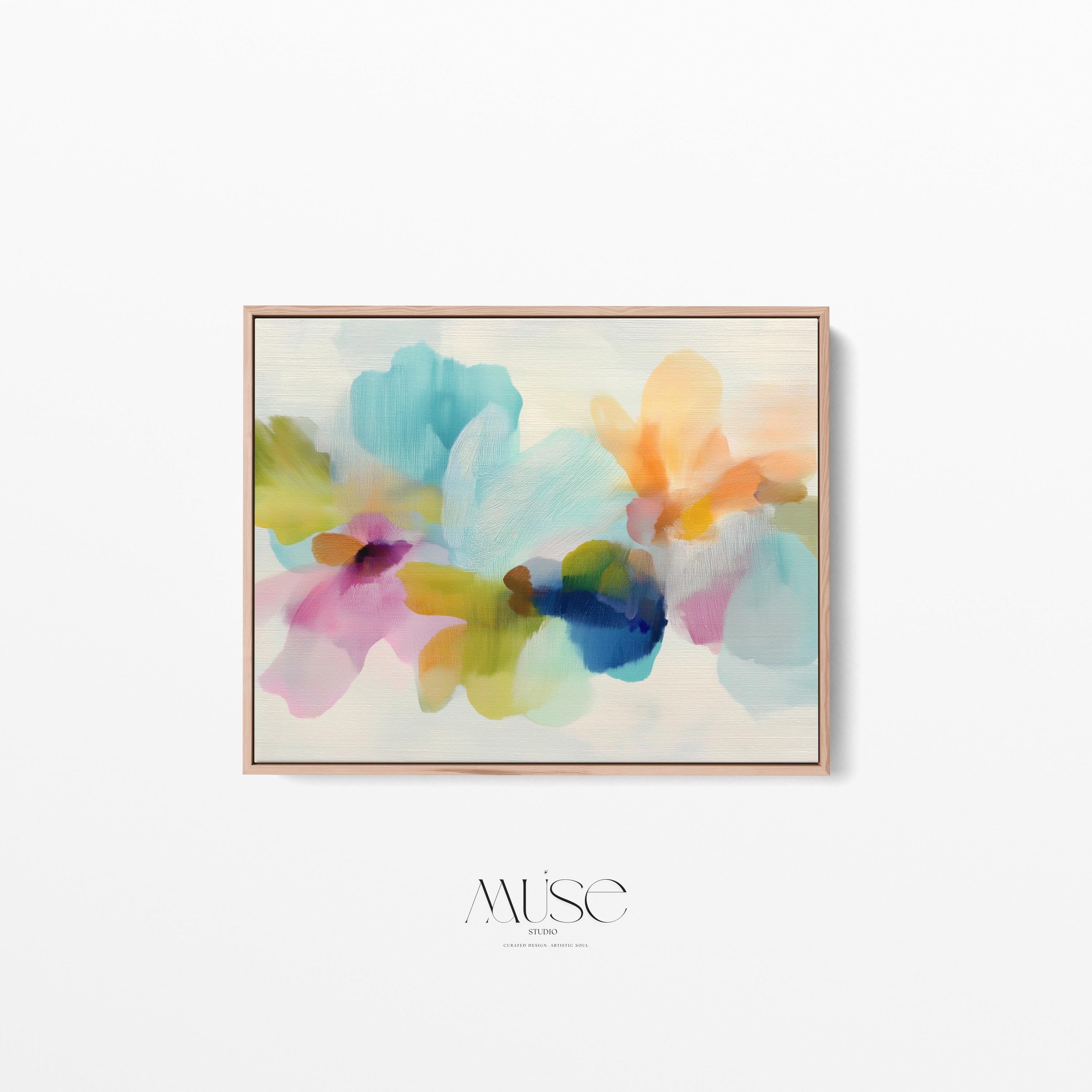 Muse Studio framed canvas wall art in pastel aqua, blush pink, peach, yellow, green, and cobalt blue floral abstract style, printed with museum-grade giclée inks on premium artist-grade canvas, available as a horizontal framed canvas, styled in a serene bedroom, living room, or soft contemporary office.