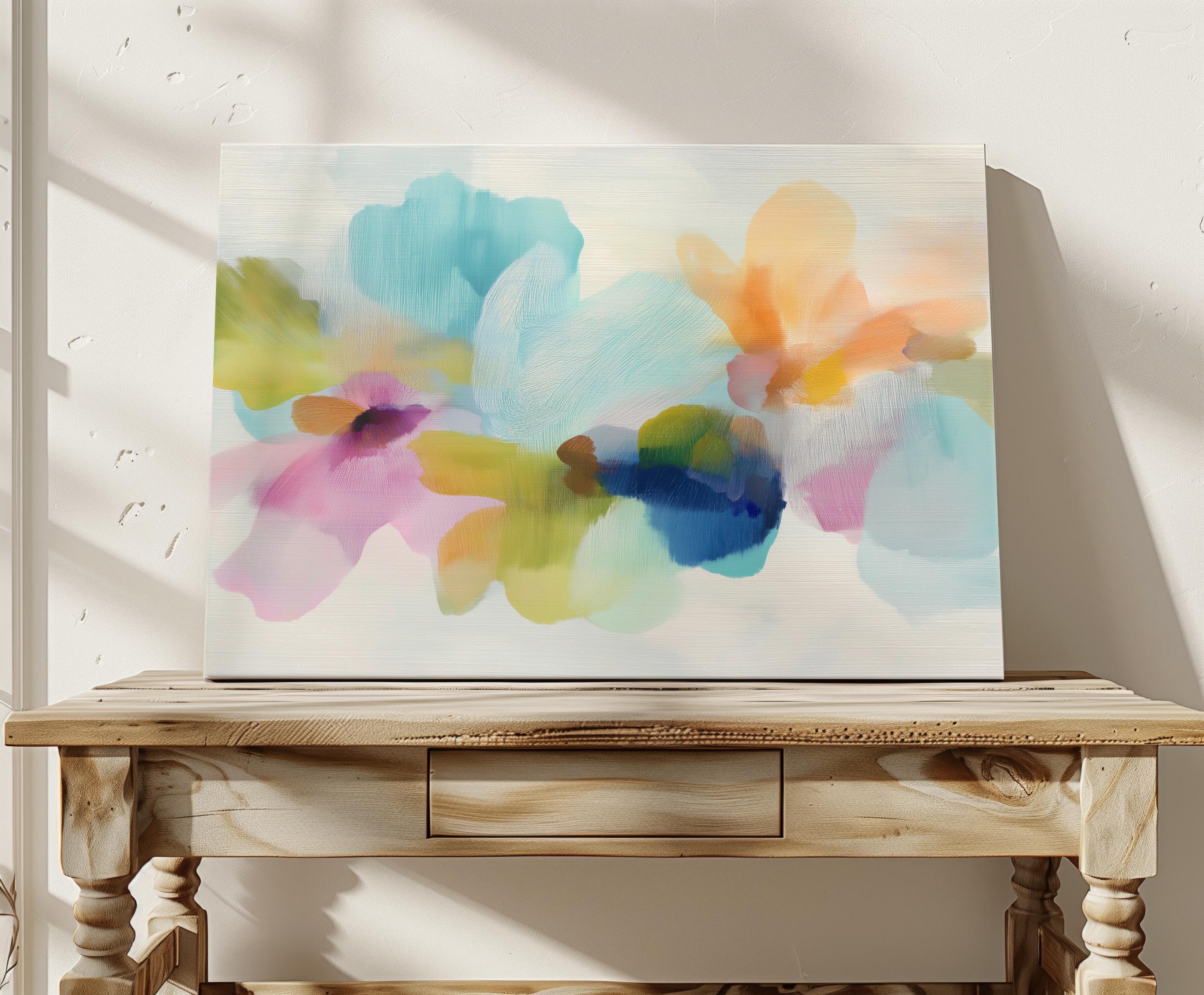 Muse Studio canvas wall art in pastel aqua, blush pink, peach, yellow, green, and cobalt blue floral abstract style, printed with museum-grade giclée inks on premium artist-grade canvas, available as horizontal stretched or rolled canvas, styled in a serene bedroom, living room, or soft contemporary office.