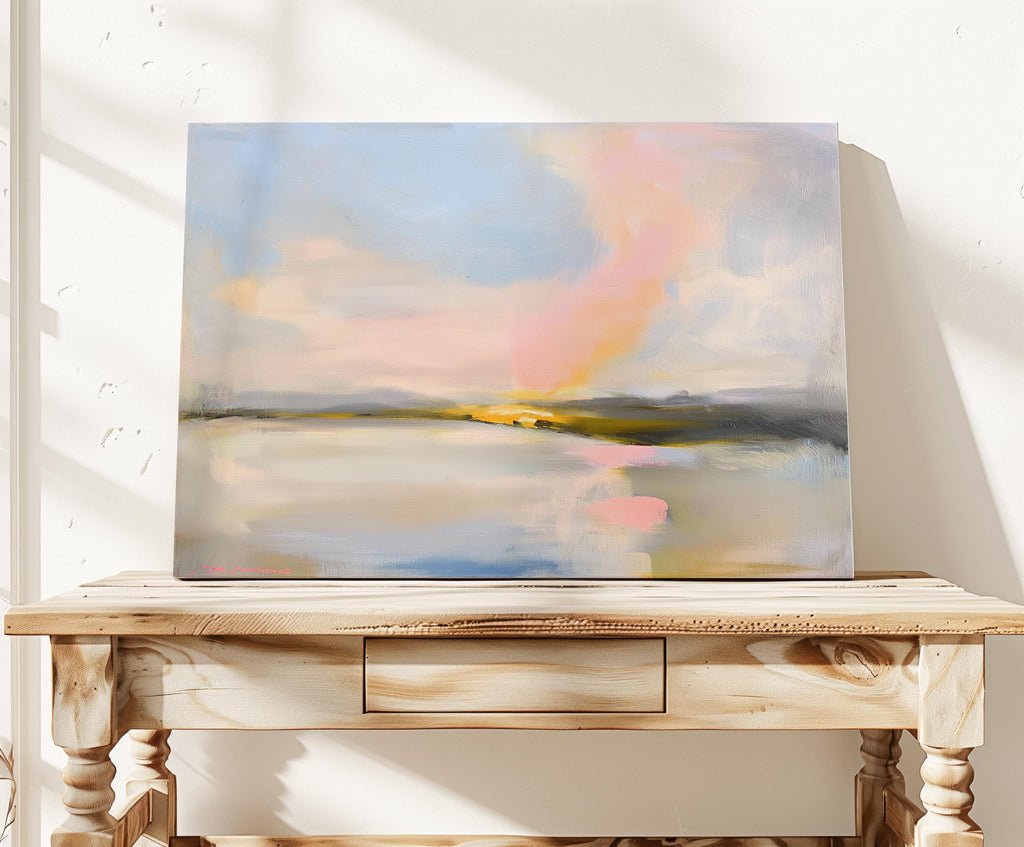 Muse Studio pastel coastal canvas wall art featuring a soft pink and blue abstract landscape with cream, gray, blush, and golden neutral tones. Large square canvas artwork with painterly horizon movement, museum-grade giclée inks, and premium gallery-wrapped cotton canvas, styled above a console for living room, bedroom, office, dining room, or modern coastal interiors.