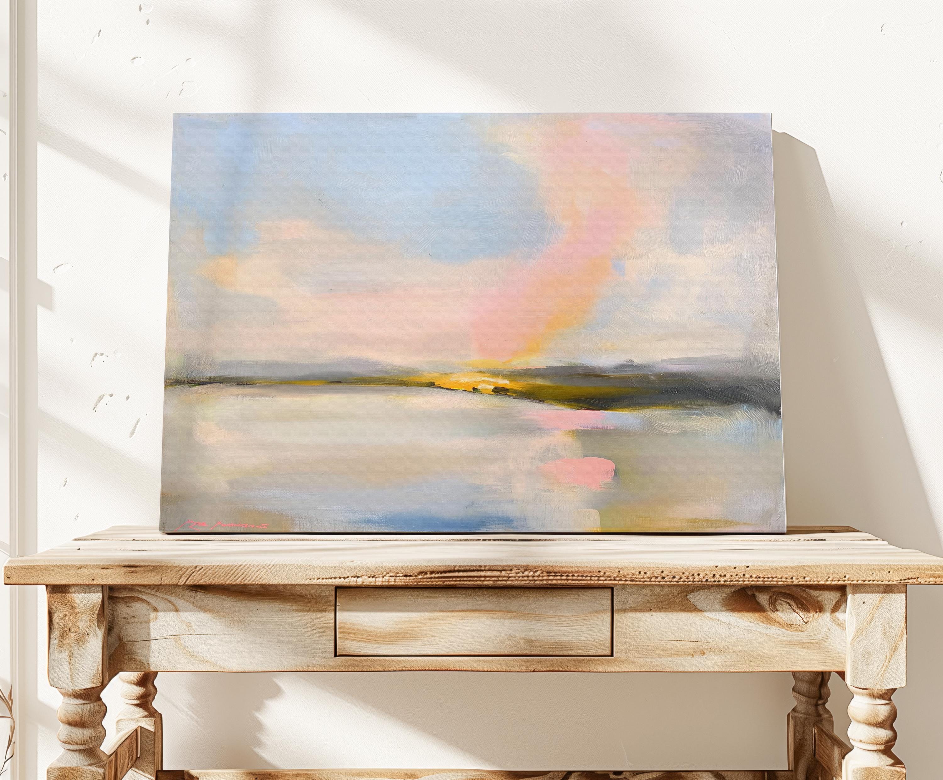 Muse Studio pastel coastal canvas wall art featuring a soft pink and blue abstract landscape with cream, gray, blush, and golden neutral tones. Large square canvas artwork with painterly horizon movement, museum-grade giclée inks, and premium gallery-wrapped cotton canvas, styled above a console for living room, bedroom, office, dining room, or modern coastal interiors.