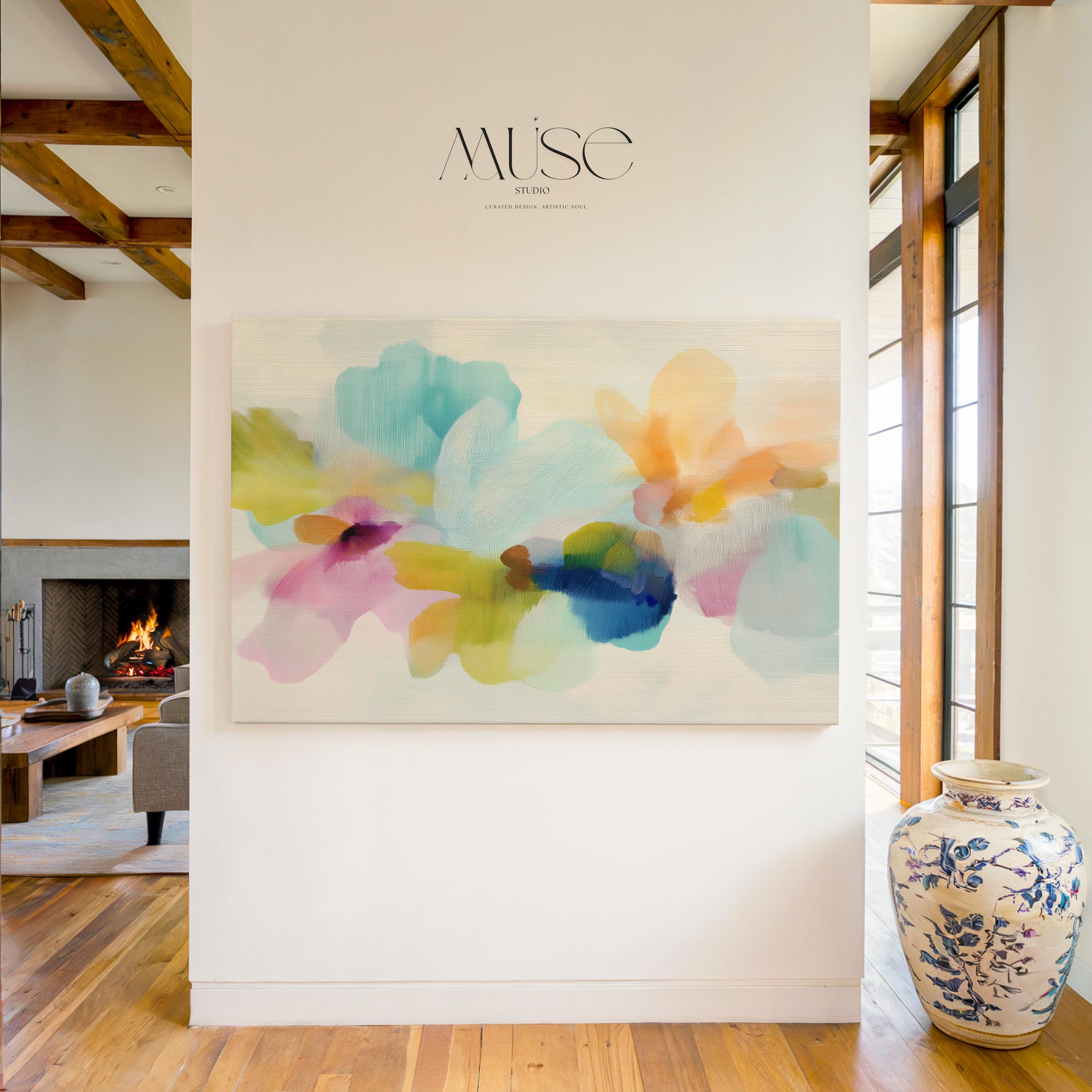 Muse Studio canvas wall art in pastel aqua, blush pink, peach, yellow, green, and cobalt blue floral abstract style, printed with museum-grade giclée inks on premium artist-grade canvas, available as horizontal stretched or rolled canvas, styled in a serene bedroom, living room, or soft contemporary office.