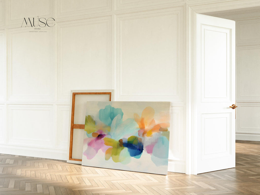 Muse Studio canvas wall art in pastel aqua, blush pink, peach, yellow, green, and cobalt blue floral abstract style, printed with museum-grade giclée inks on premium artist-grade canvas, available as horizontal stretched or rolled canvas, styled in a serene bedroom, living room, or soft contemporary office.