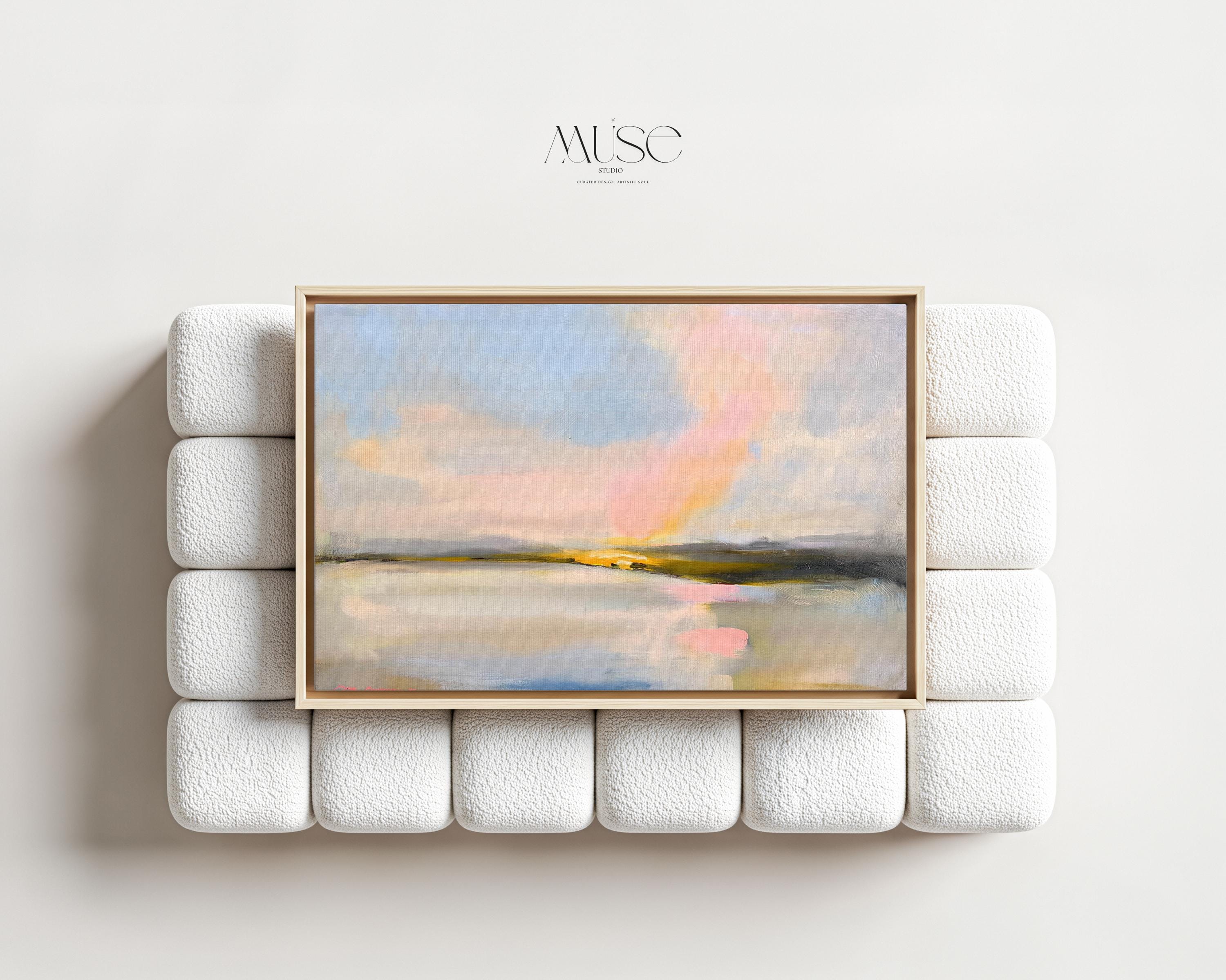 Muse Studio framed abstract landscape wall art with pastel pink, blue, cream, gray, and golden neutral tones. Large square framed canvas artwork with soft coastal horizon movement, museum-grade giclée inks, premium cotton canvas, and custom wood float frame options, styled for living room, bedroom, office, dining room, or elevated modern coastal decor.