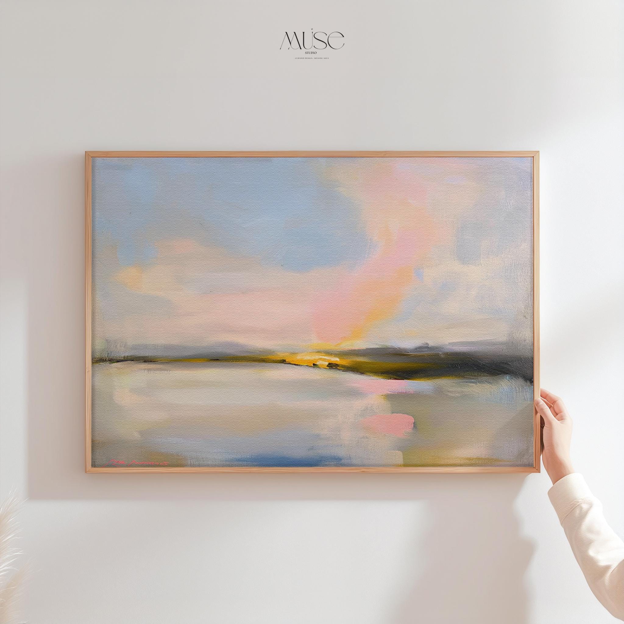 Muse Studio framed abstract landscape wall art with pastel pink, blue, cream, gray, and golden neutral tones. Large square framed canvas artwork with soft coastal horizon movement, museum-grade giclée inks, premium cotton canvas, and custom wood float frame options, styled for living room, bedroom, office, dining room, or elevated modern coastal decor.