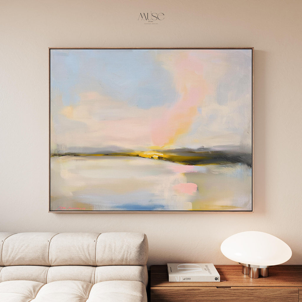 Muse Studio framed abstract landscape wall art with pastel pink, blue, cream, gray, and golden neutral tones. Large square framed canvas artwork with soft coastal horizon movement, museum-grade giclée inks, premium cotton canvas, and custom wood float frame options, styled for living room, bedroom, office, dining room, or elevated modern coastal decor.