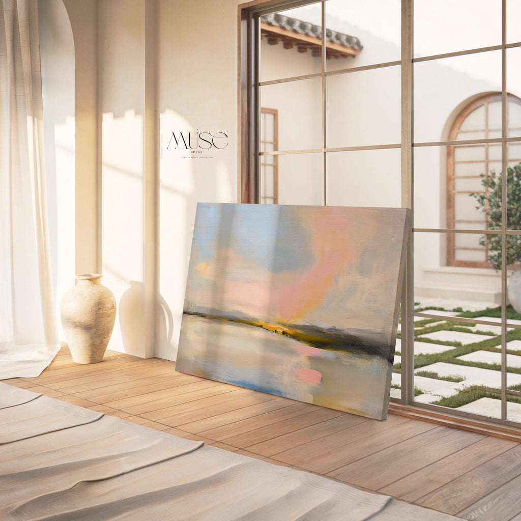 Muse Studio pastel coastal canvas wall art featuring a soft pink and blue abstract landscape with cream, gray, blush, and golden neutral tones. Large square canvas artwork with painterly horizon movement, museum-grade giclée inks, and premium gallery-wrapped cotton canvas, styled above a console for living room, bedroom, office, dining room, or modern coastal interiors.