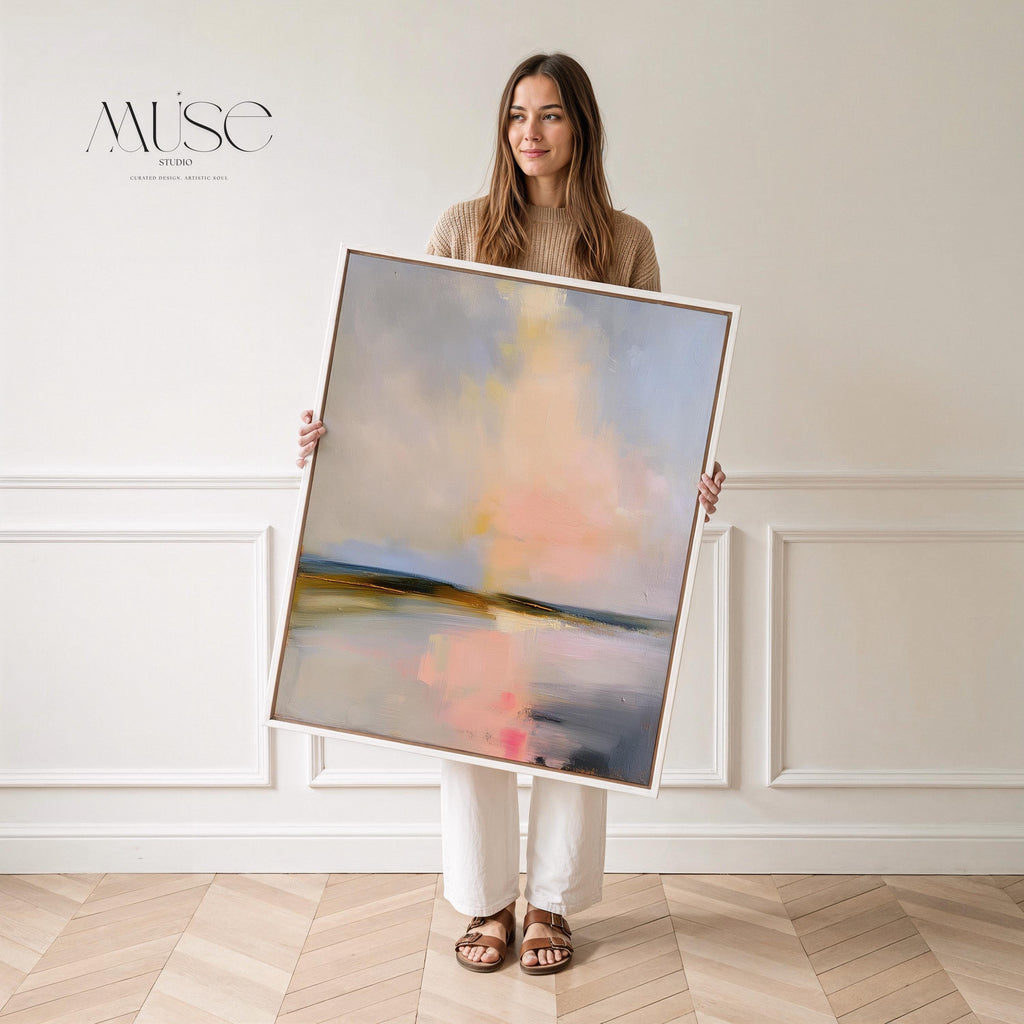 Muse Studio framed coastal wall art featuring a pastel abstract landscape in soft blue, blush pink, cream, gray, and golden neutral tones. Vertical framed canvas artwork with serene horizon movement, museum-grade giclée inks, premium cotton canvas, and custom wood float frame options, styled for living room, bedroom, office, dining room, or modern coastal interiors.