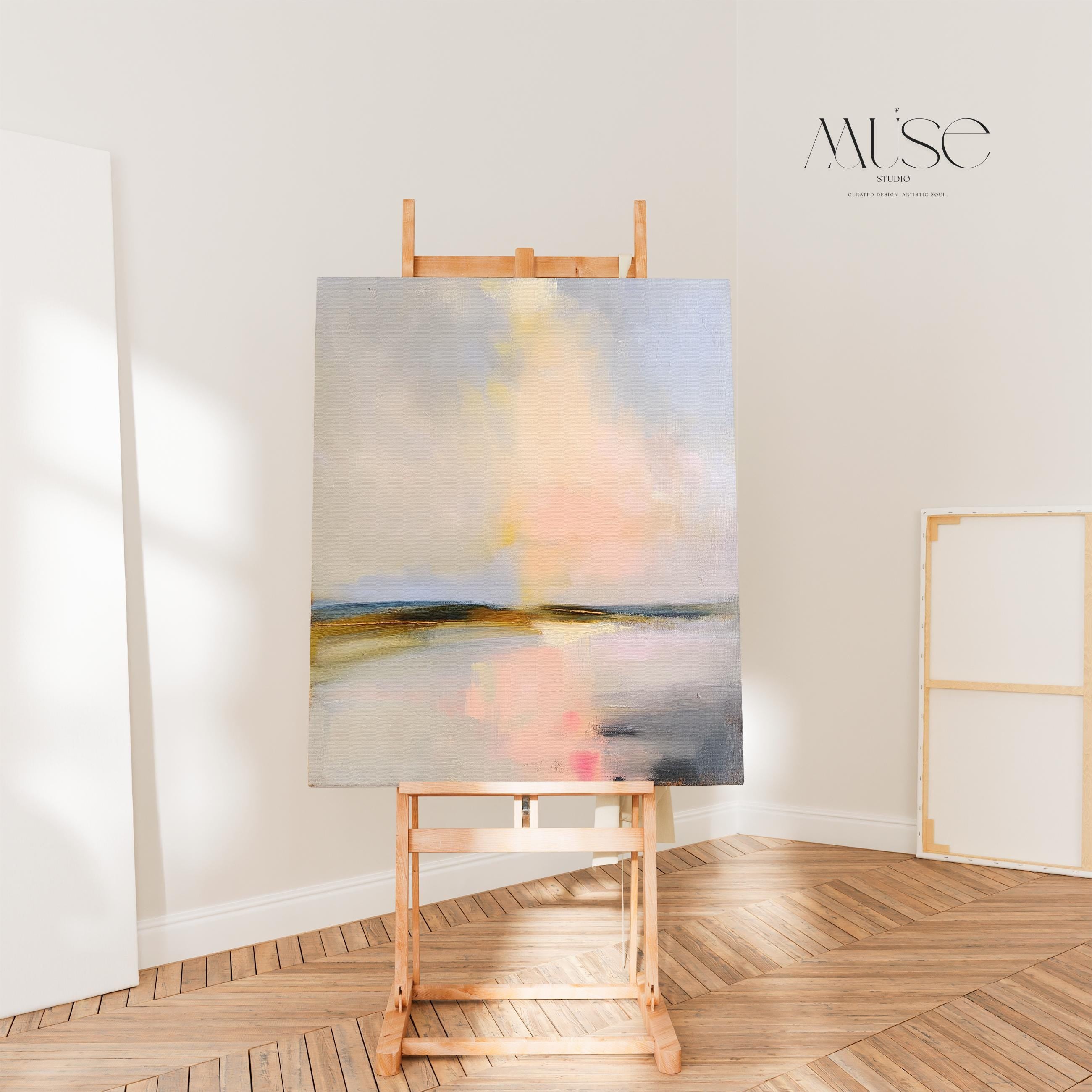 Muse Studio pastel abstract canvas wall art with a serene coastal landscape in soft blue, blush pink, cream, gray, and golden neutral tones. Vertical canvas artwork with painterly horizon movement, museum-grade giclée inks, and premium gallery-wrapped cotton canvas, styled for bedroom, living room, office, dining room, or softly modern coastal decor.
