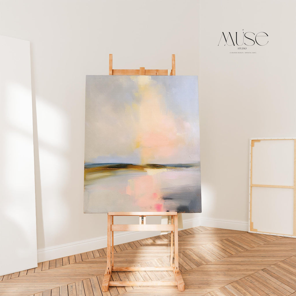 Muse Studio pastel abstract canvas wall art with a serene coastal landscape in soft blue, blush pink, cream, gray, and golden neutral tones. Vertical canvas artwork with painterly horizon movement, museum-grade giclée inks, and premium gallery-wrapped cotton canvas, styled for bedroom, living room, office, dining room, or softly modern coastal decor.