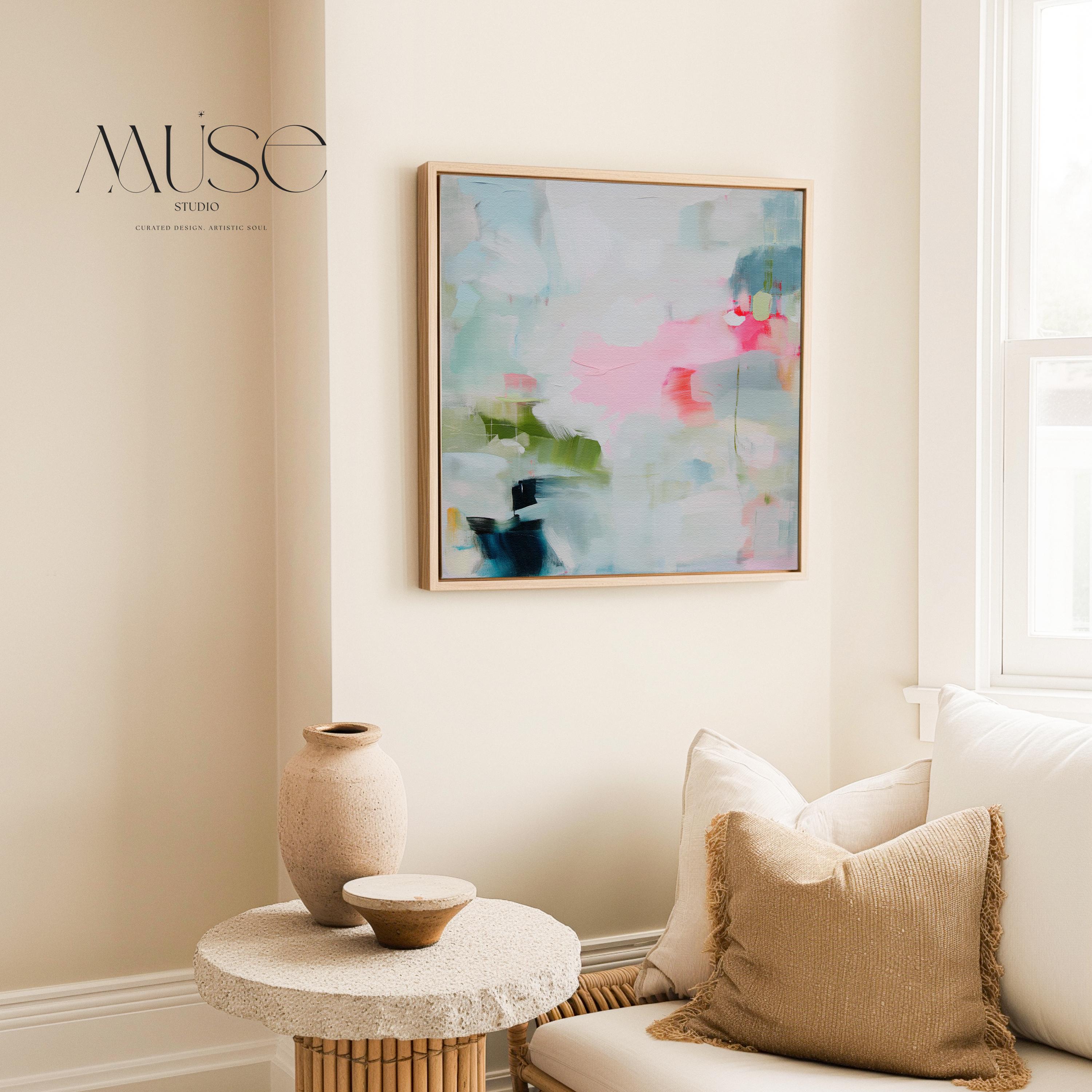 Muse Studio colorful abstract framed canvas wall art featuring soft blue, blush pink, green, coral, white, and navy painterly layers. Museum-grade giclée print on premium gallery-wrapped canvas with custom wood float frame options in natural, white, black, antique gold, and antique silver for modern coastal living room decor.