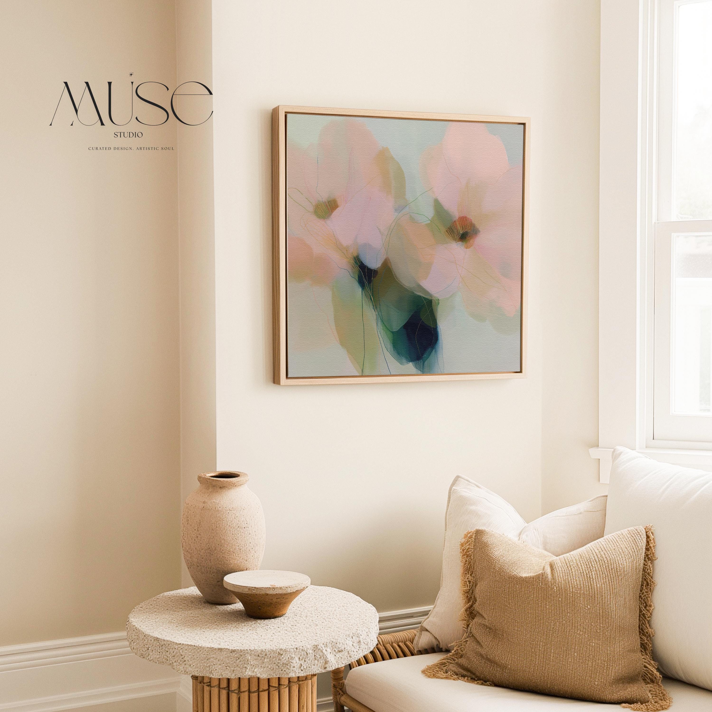 Muse Studio Rosa Vento 1086 neutral botanical wall art shown as a large framed canvas in a soft dining room with cream curtains, warm wood chairs, and vintage rug. This modern floral wall art features blush pink, sage green, aqua, cream, and deep blue-green abstract flowers with delicate linework. Printed with museum-grade giclée inks on premium gallery-wrapped canvas for bedroom, living room, dining room, or office styling.