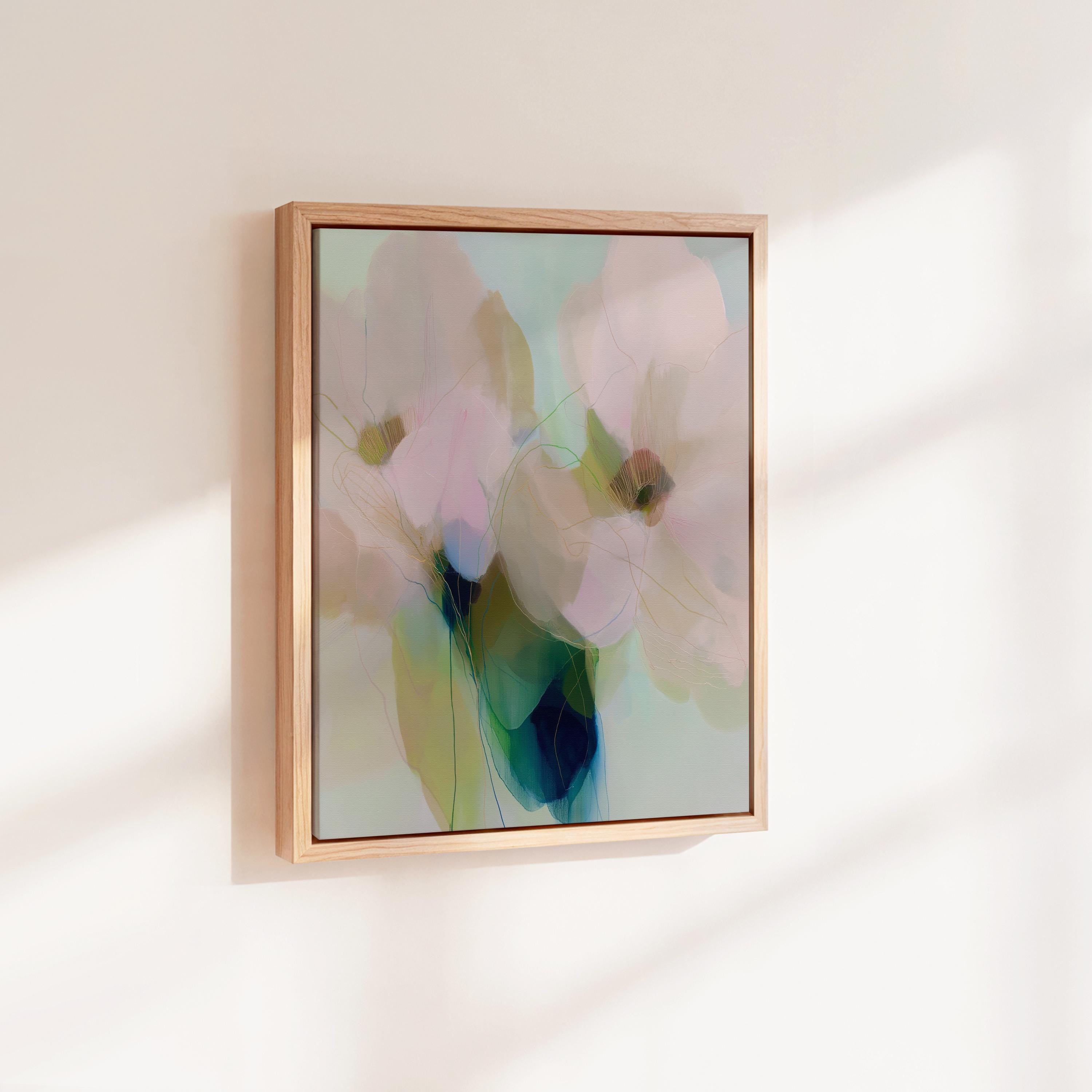Muse Studio soft botanical framed canvas wall art with pastel blue, blush pink, sage green, and celadon abstract floral forms, printed with museum-grade giclée inks on premium gallery-wrapped artist canvas and custom framed in natural, white, black, antique gold, or antique silver wood float frame options for bedroom, living room, office, and dining room decor.